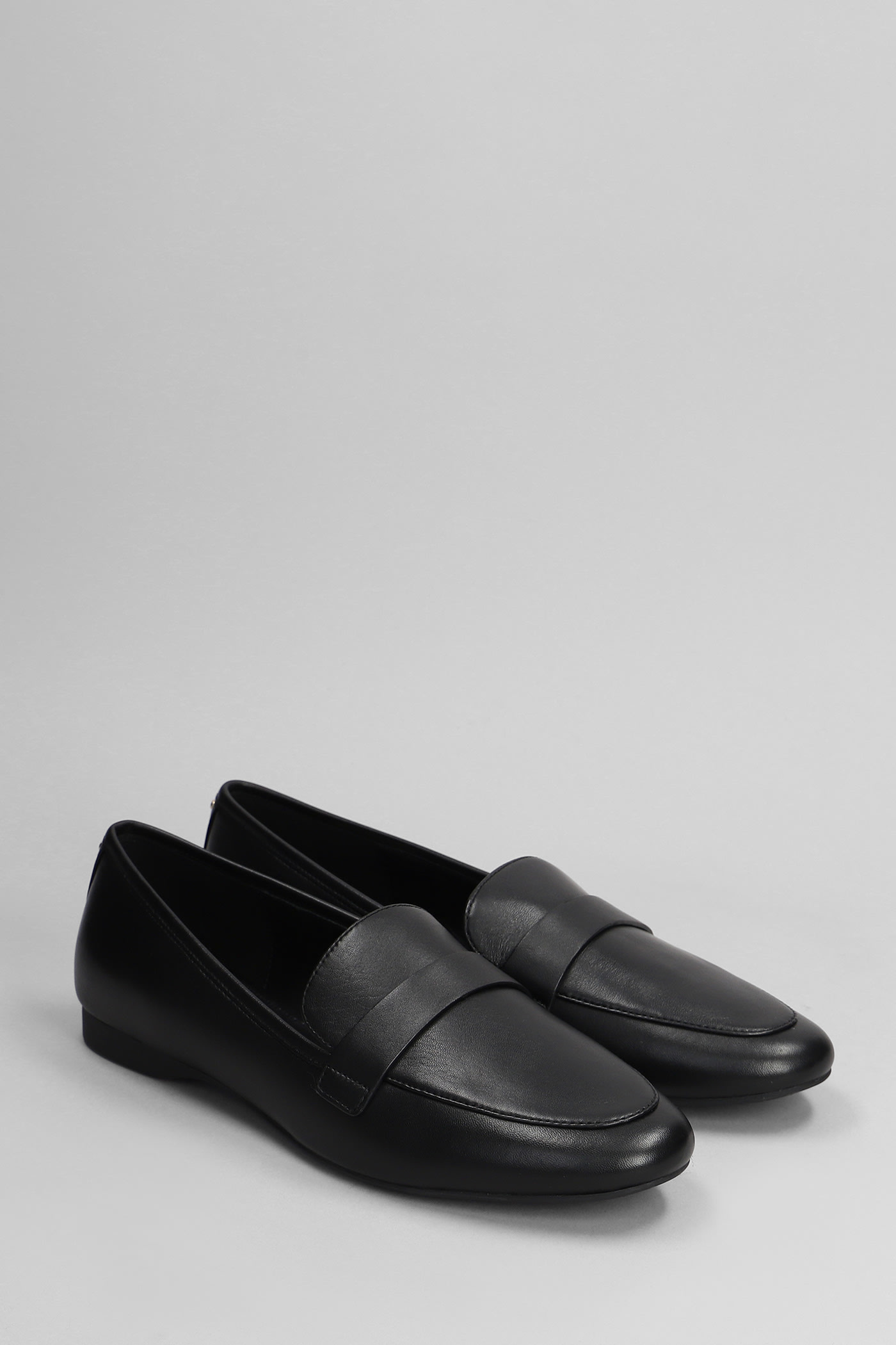 Shop Michael Kors Regan Flex Loafers In Black Leather