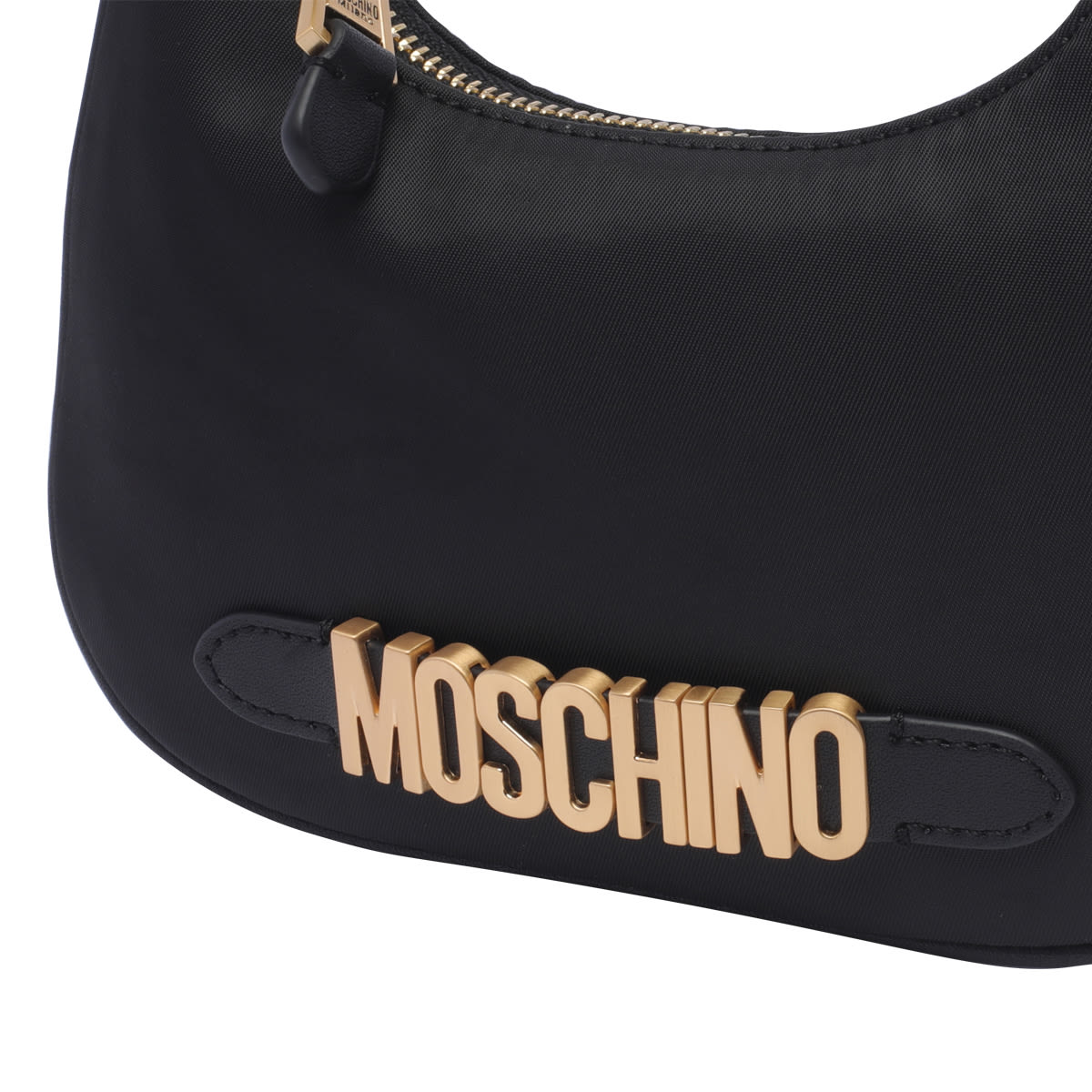 Shop Moschino Lettering Logo Shoulder Bag In Black