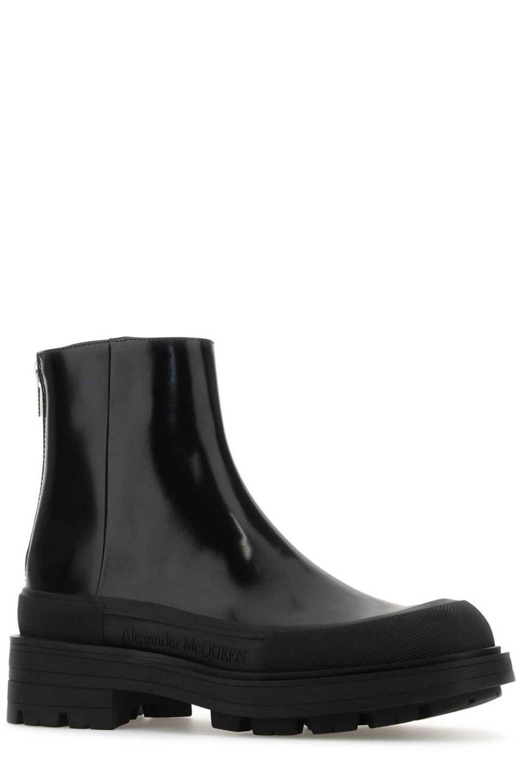 Shop Alexander Mcqueen Zipped Ankle Boots In Nero