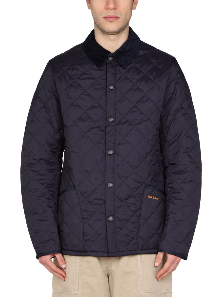 Barbour Heritage Liddesdale Blue Jacket With Classic Corduroy Collar And Logo Lettering On The Front In Tech In Blue