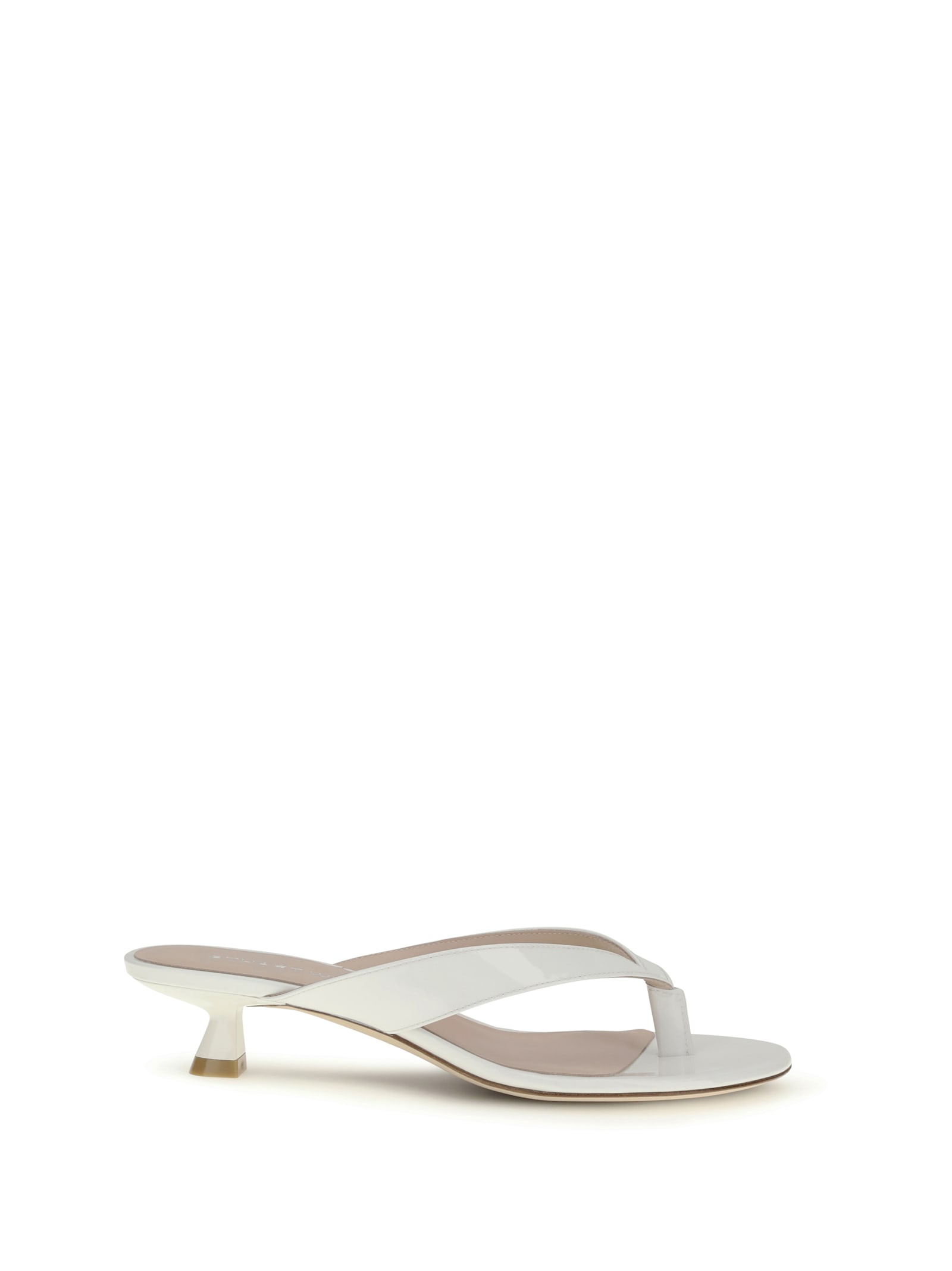 Stuart Weitzman 35mm Rio Sleek Patent Leather Thong Sandals In White