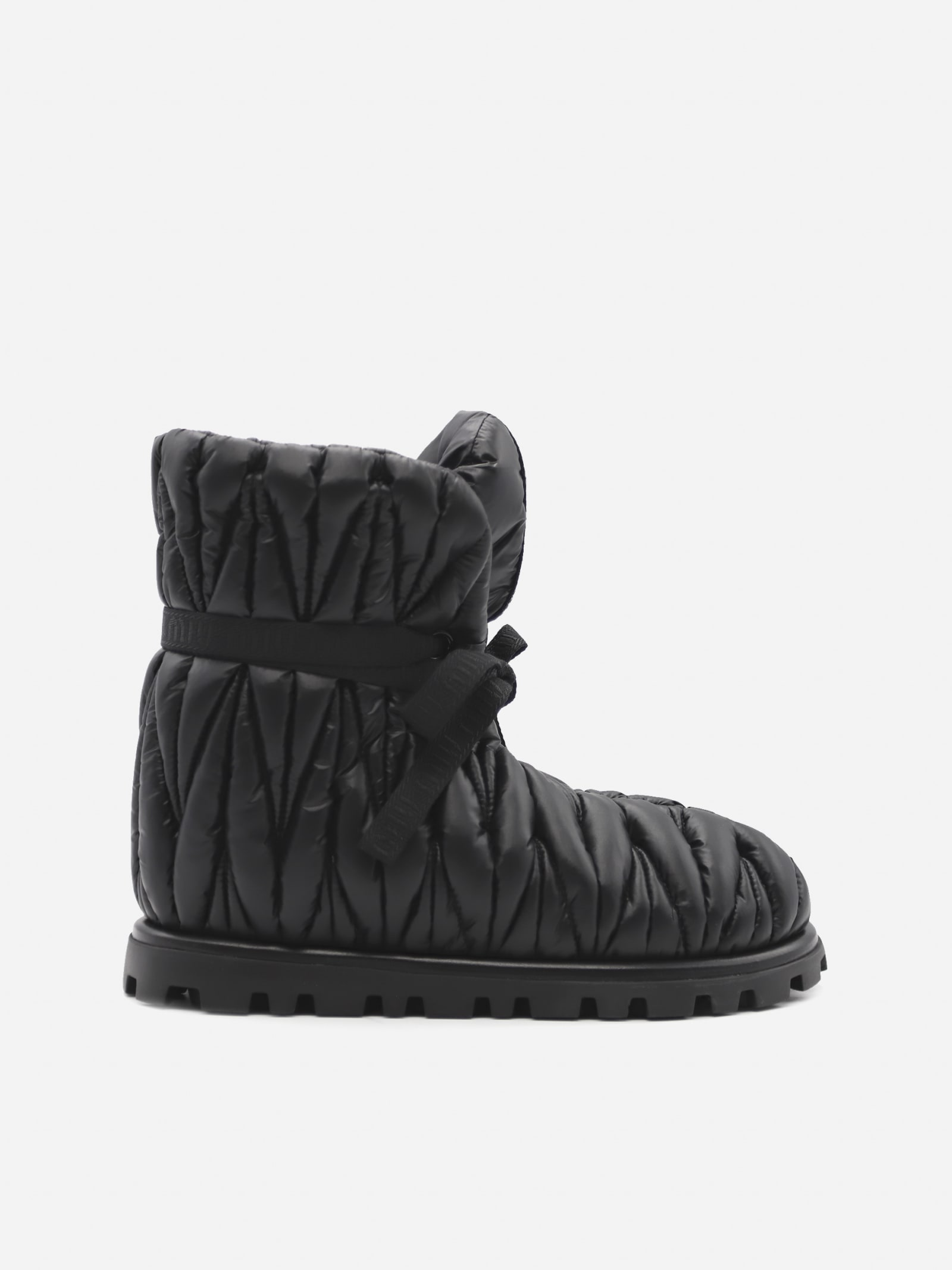 Buy Miu Miu Quilted Nylon Ankle Boots online, shop Miu Miu shoes with free shipping