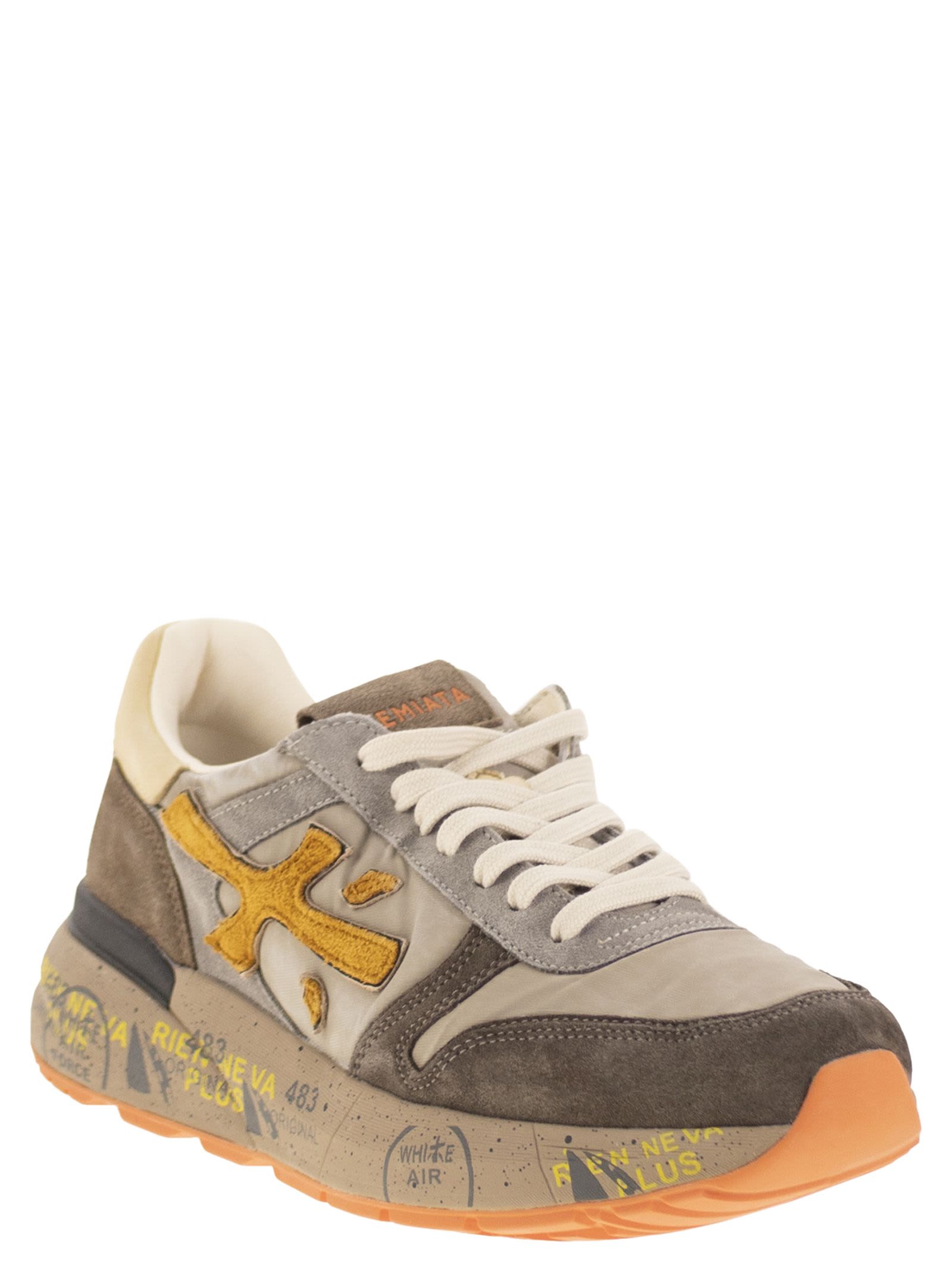 Premiata Sneakers With Contrast Panels And Round Toe In Brown