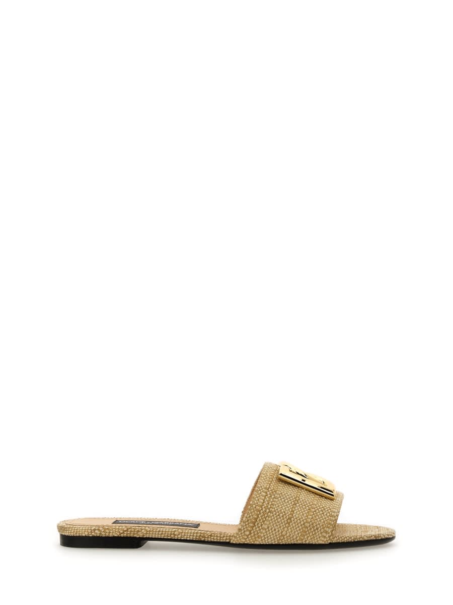Shop Dolce & Gabbana Raffia Slide Sandal In White