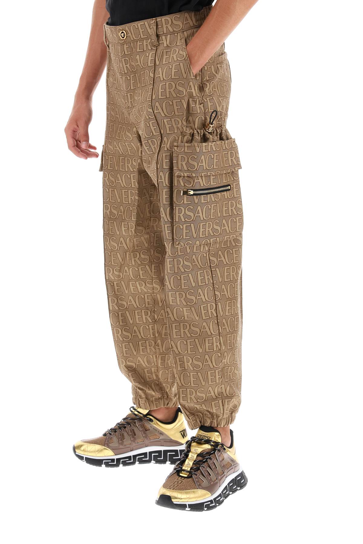 Shop Versace Allover Cargo Pants In Brown Beige (brown)
