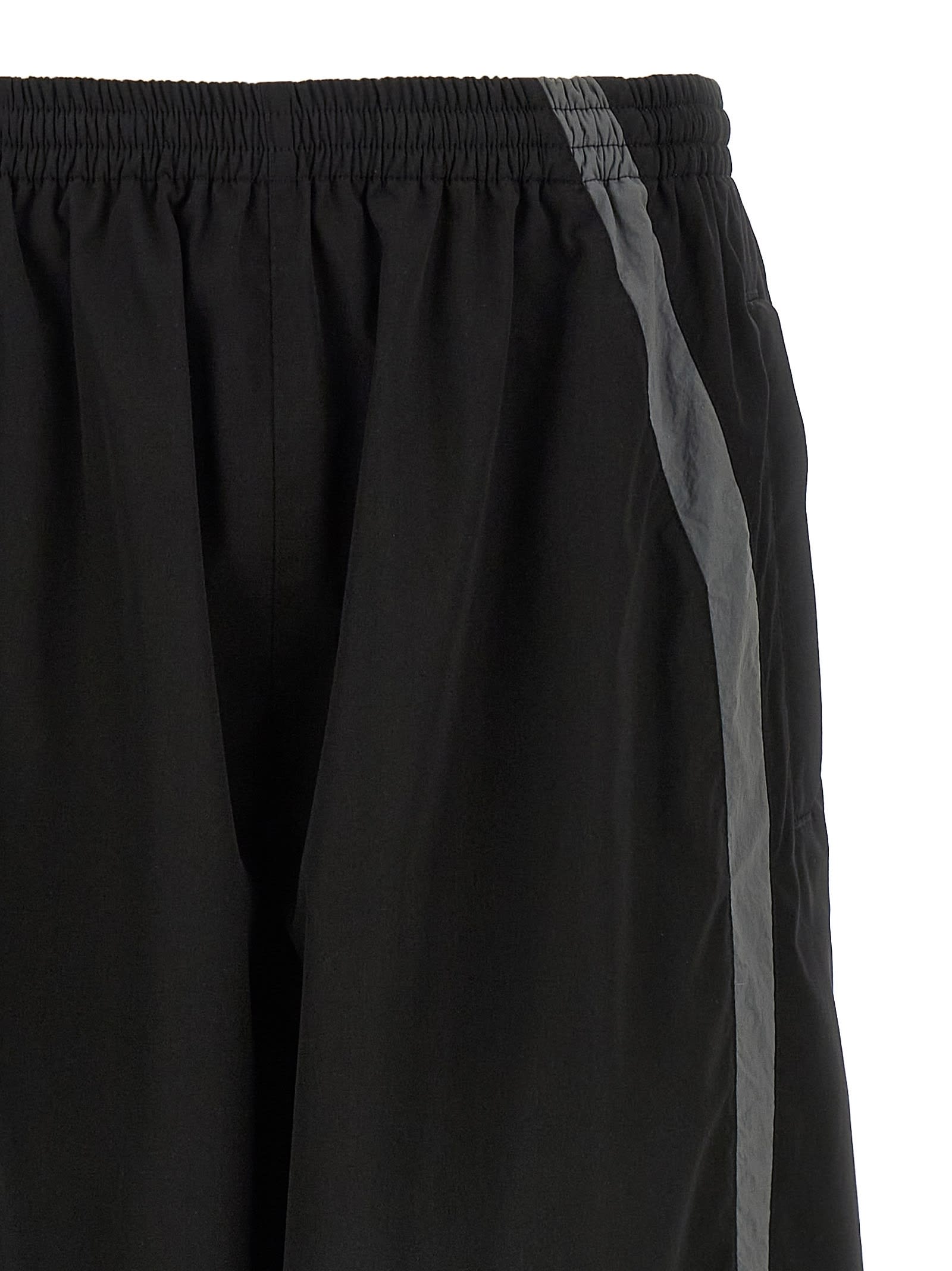 Balenciaga Men Black Oversized Tracksuit Pants With Contrasting Yokes In Tech Fabric Man In Black