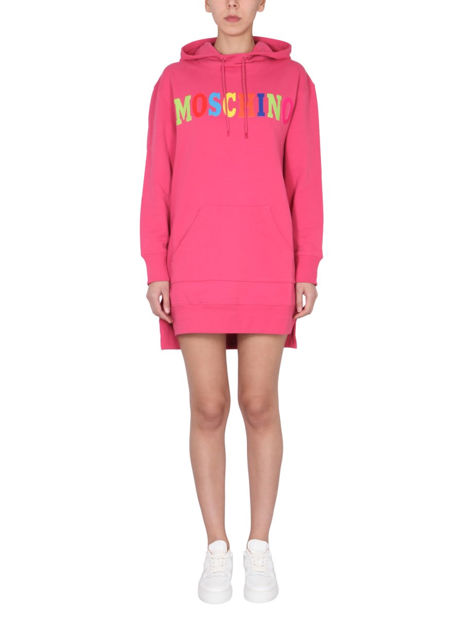 Shop Moschino Dress With Multicolor Flocked Logo In Fuchsia