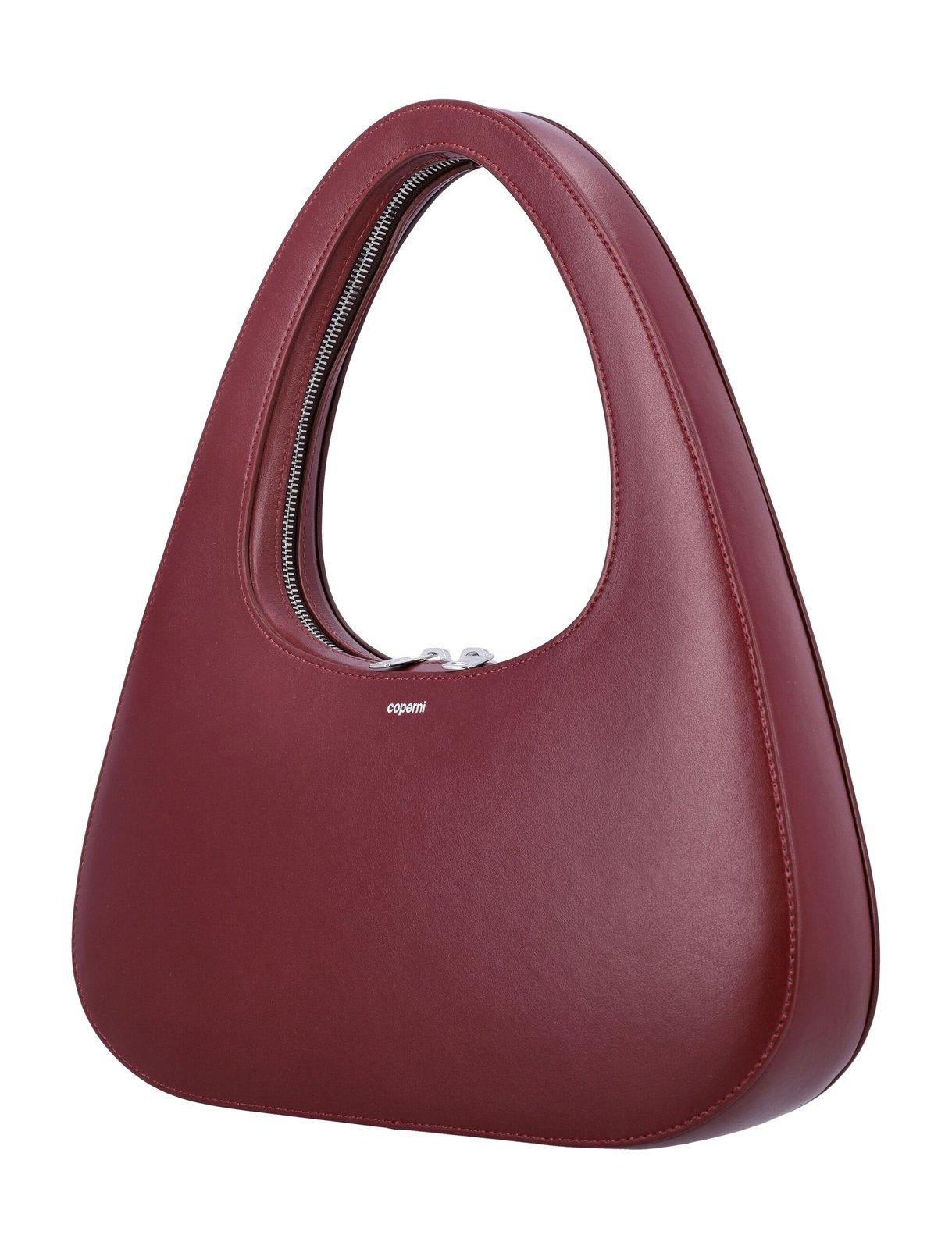 Shop Coperni Large Baguette Swipe Bag In Red