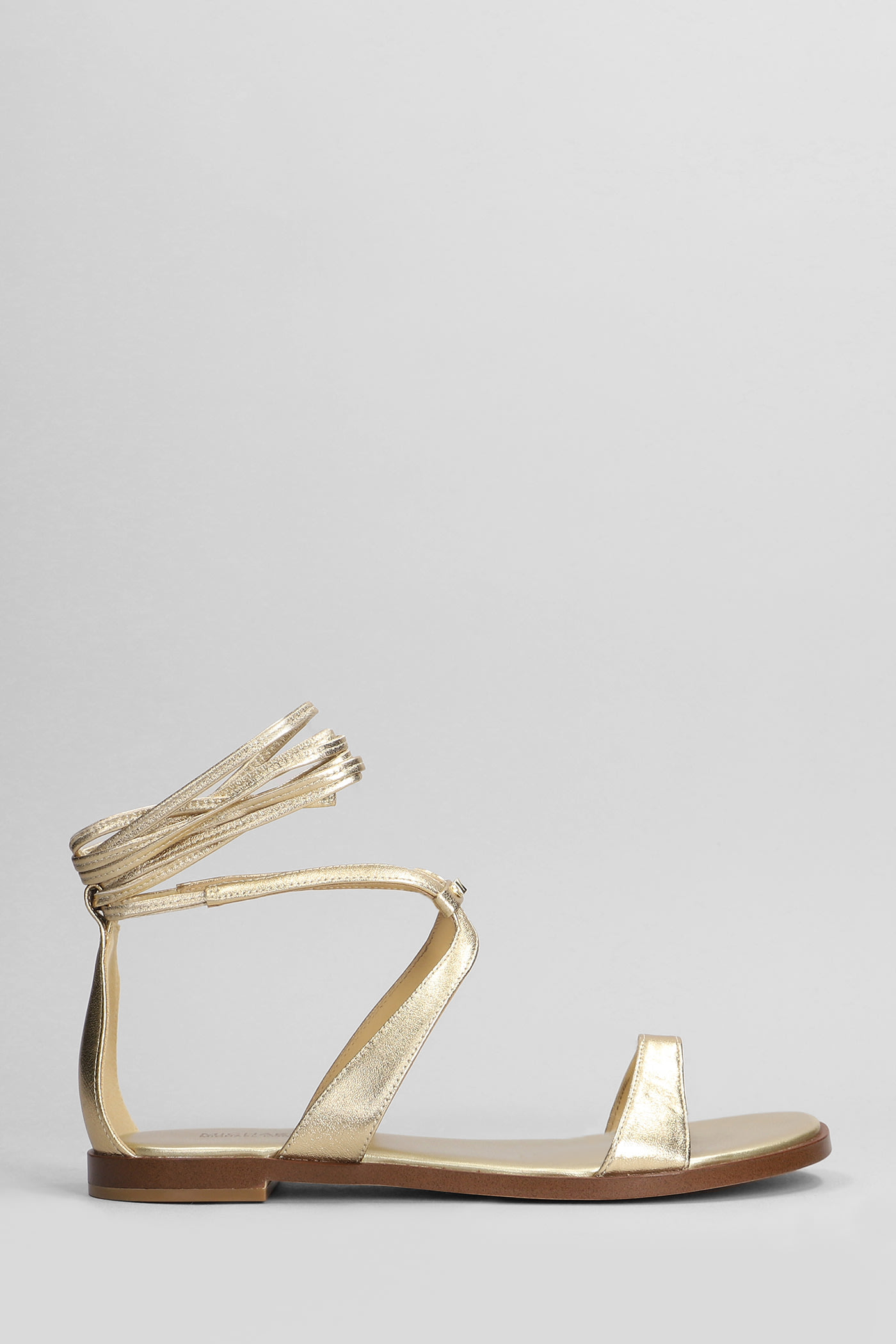 Shop Michael Kors Amara Flats In Gold Leather