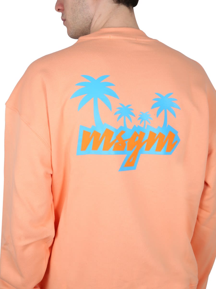 Msgm Graphic Print Cross-neck Sweatshirt With Ribbed Trim In Orange