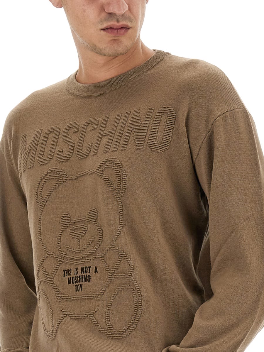 Shop Moschino Jersey With Logo In Brown