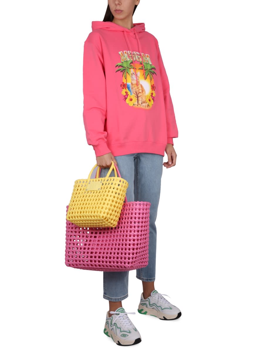 Msgm Vibrant Sweatshirt With Drawstring Hood And Playful Graphic In Fuchsia