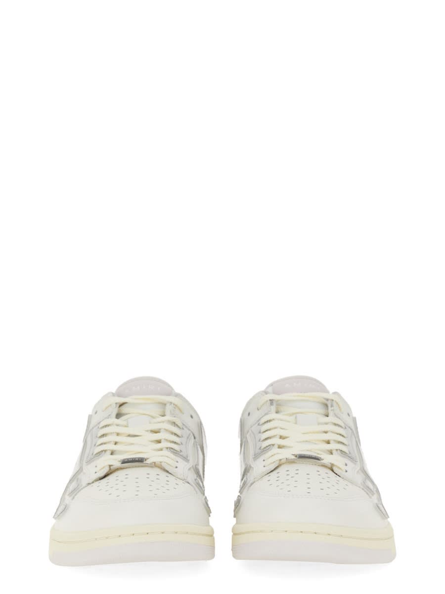 Shop Amiri Metallic Skel Sneaker In White