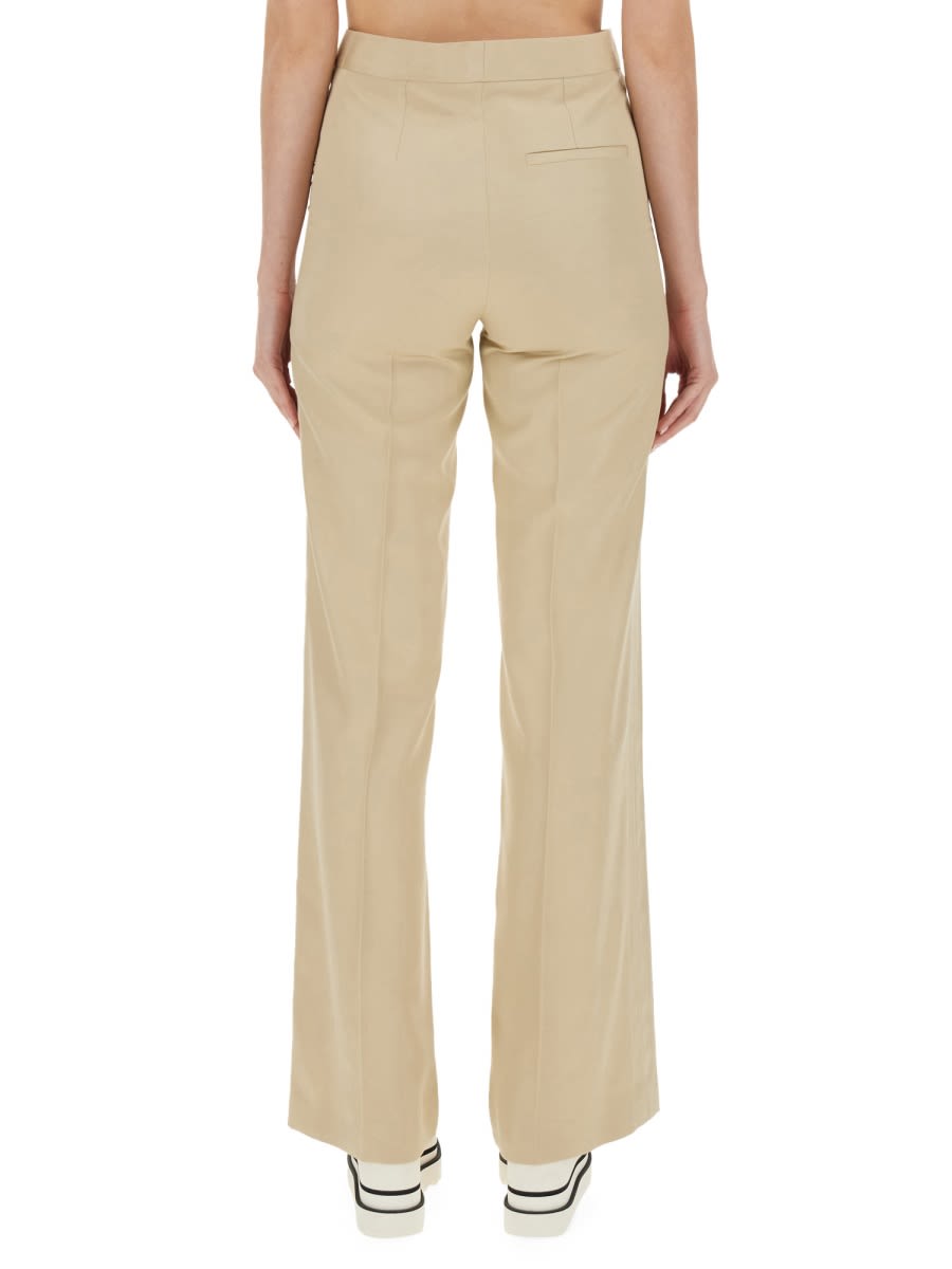 Shop Stella Mccartney Flare Fit Pants In Beige