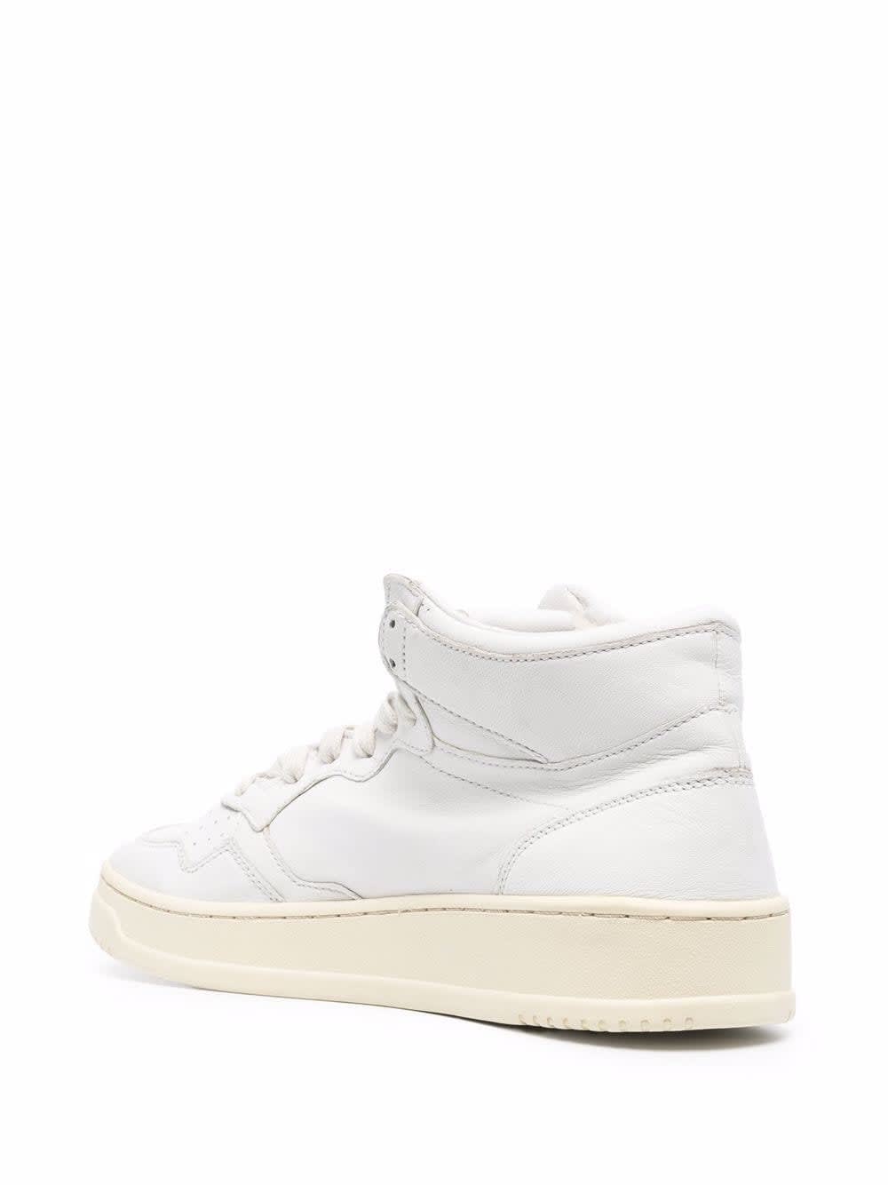 Shop Autry Medalist Mid Sneakers In White Leather