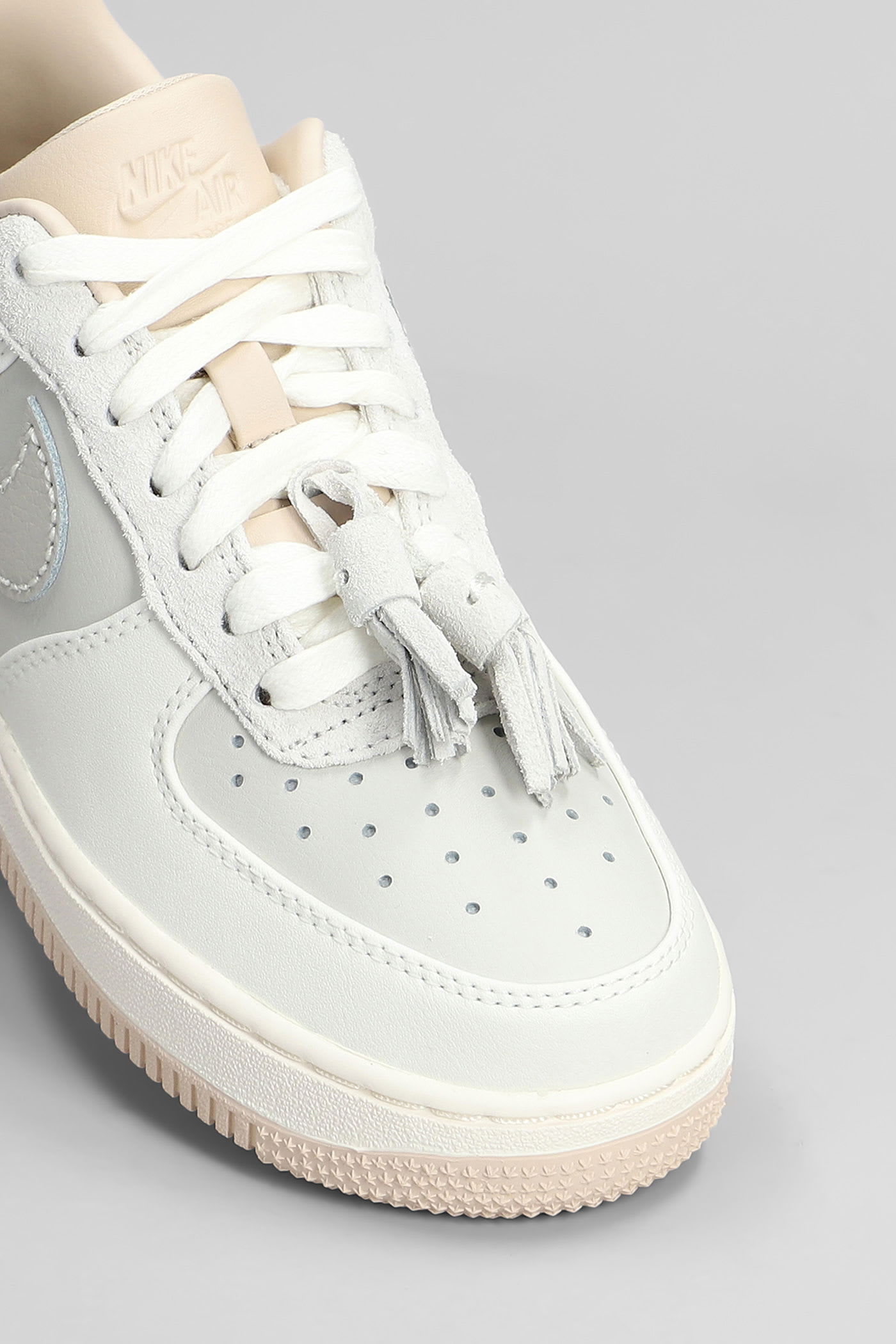 Nike Air Force 1 07 Sneakers In Beige Leather In White