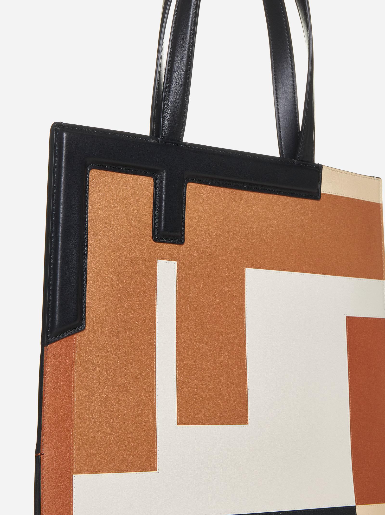 Shop Fendi Flip Medium Ff Puzzle Leather Bag In Nro+brandy+mlc