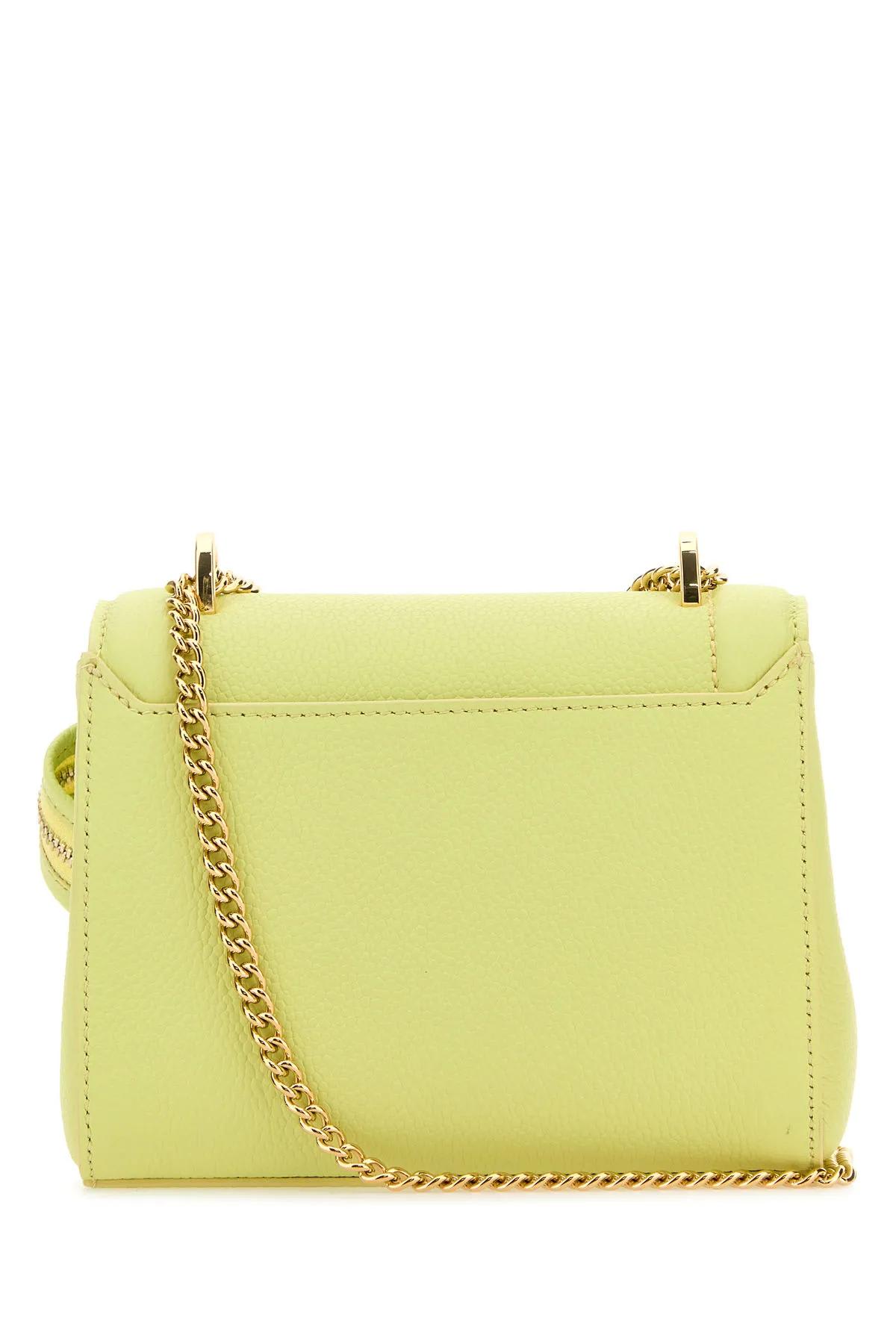Shop Lancel Fluo Yellow Leather Ninon Handbag In Lime