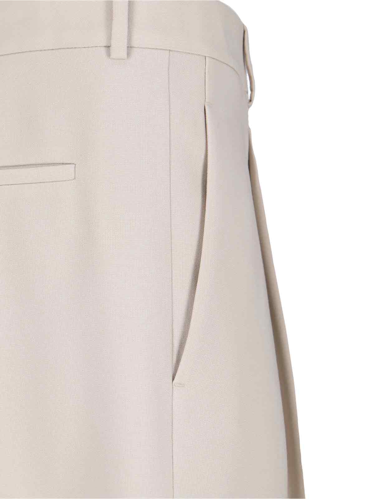 Saint Laurent Trousers With Front Pleats And Back Pockets In Stripped