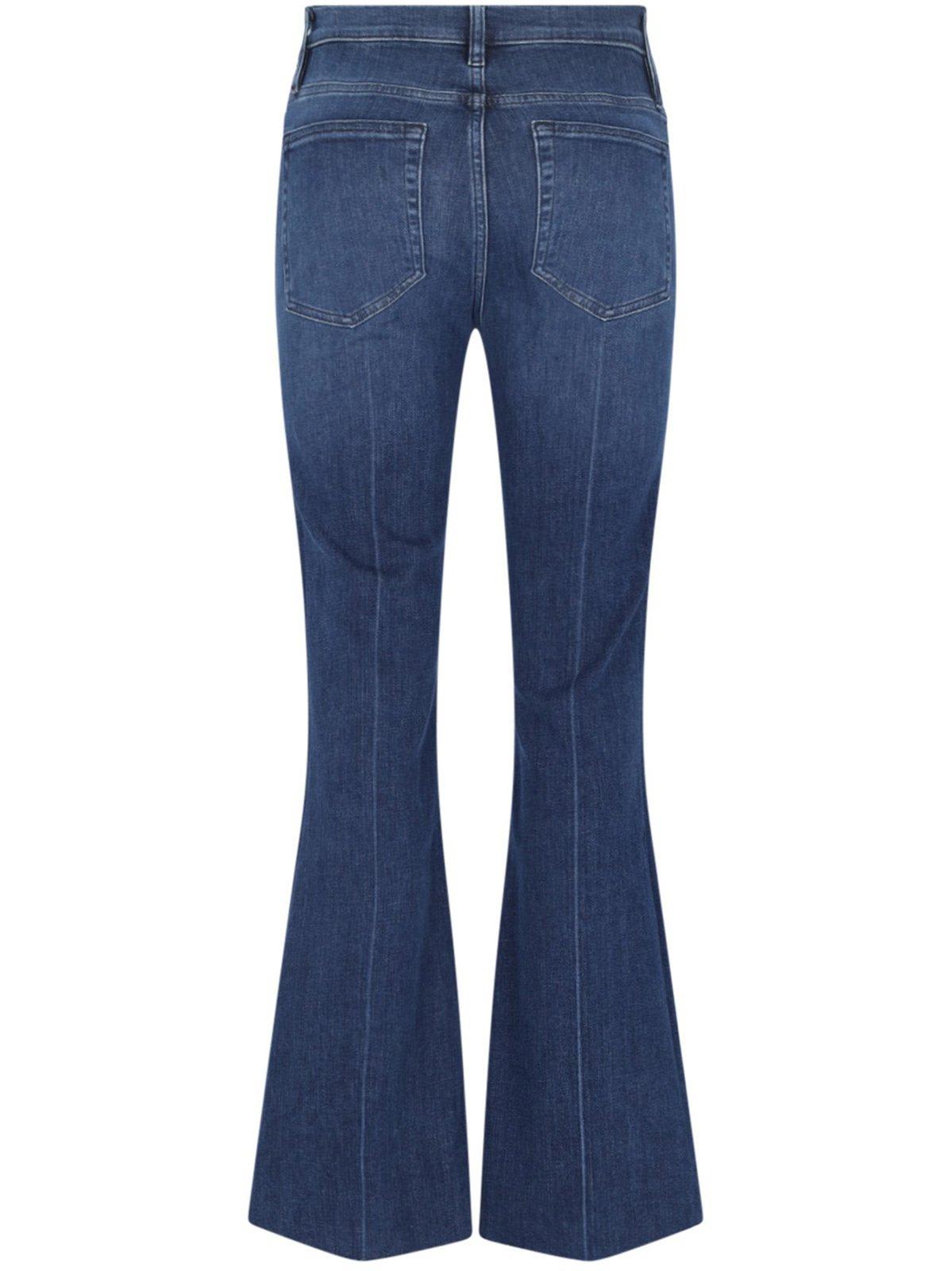 Shop Frame Le Easy Flare Raw Fray Jeans In Calvin