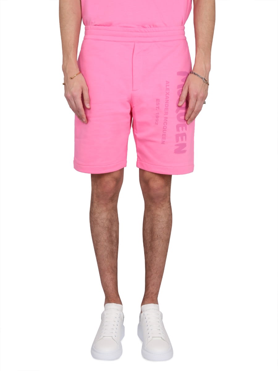 Shop Alexander Mcqueen Bermuda Shorts With Graffiti Logo Print In Pink