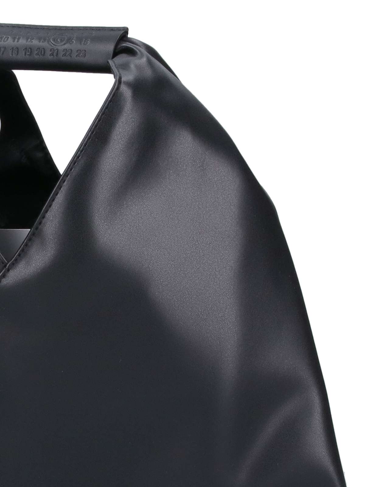 Mm6 Maison Margiela Mm6 By Maison Margiela Asymmetrical Black Mini Bag With Distinctive Handle In Black