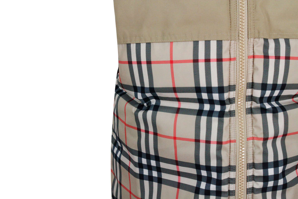 Shop Burberry Padded Sleeveless Gilet With Hood And Zip Closure In Beige