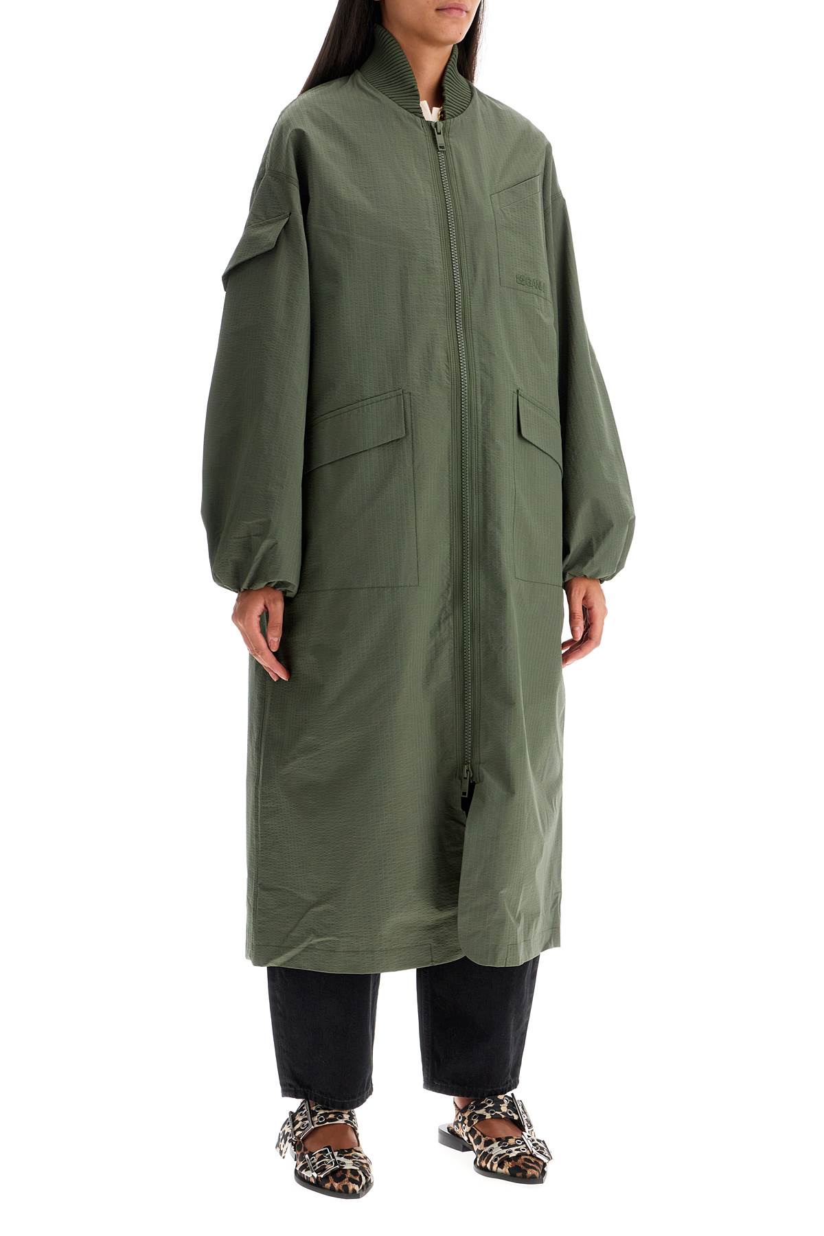 Shop Ganni Long Tech Seersucker Trench In Beetle (green)