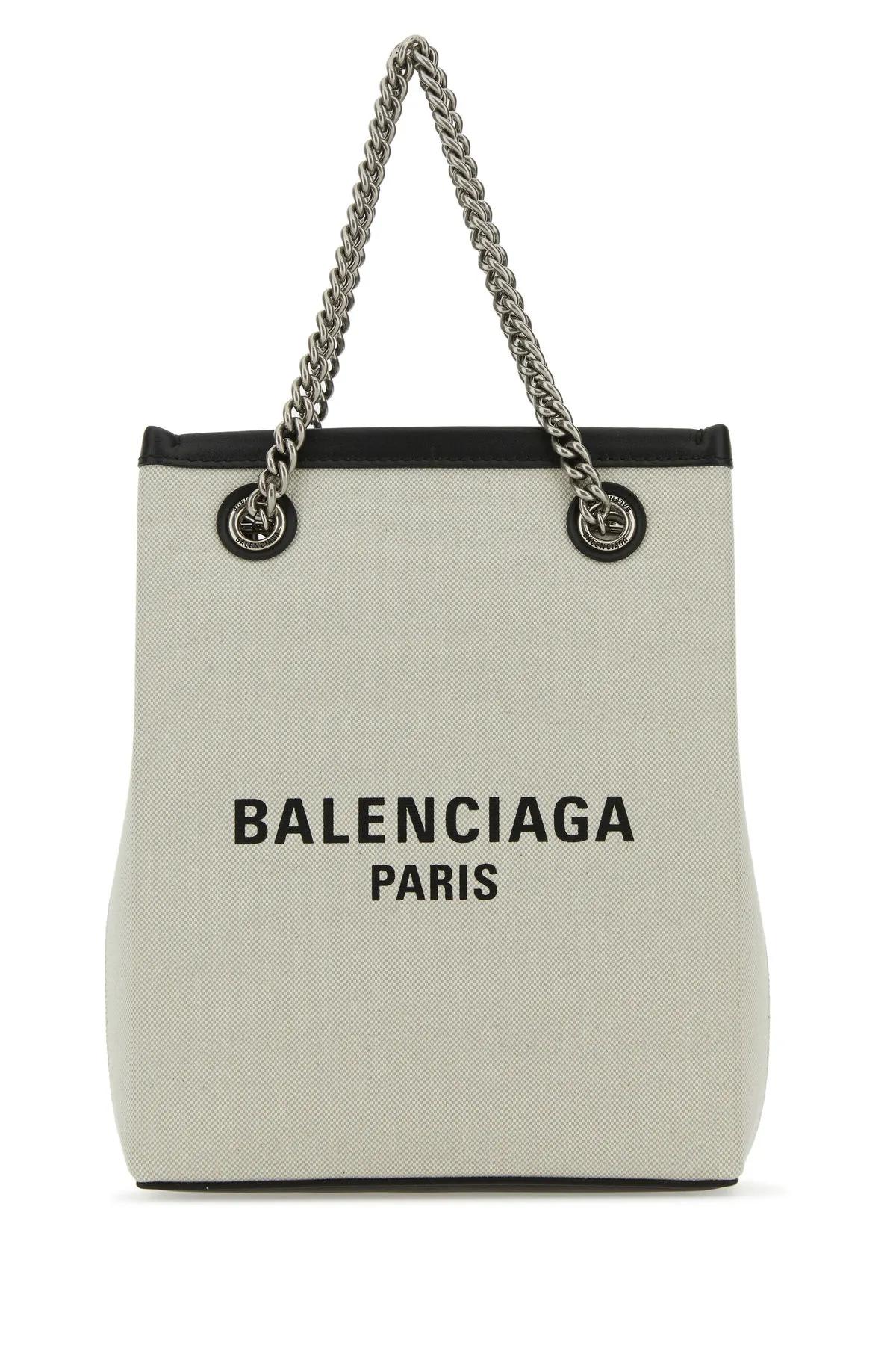 Shop Balenciaga Sand Canvas Duty Free Handbag In Beige