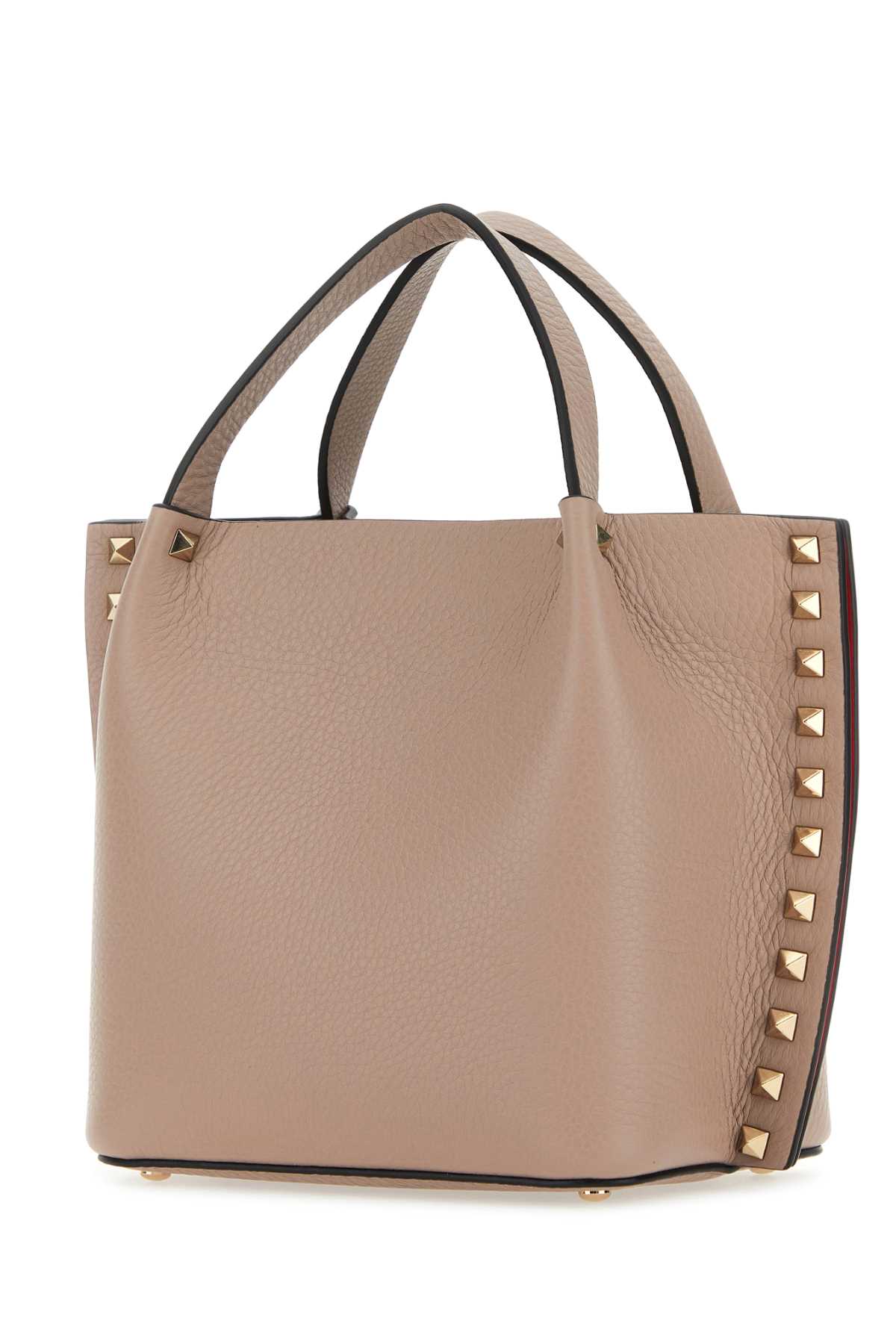 Shop Valentino Antiqued Pink Leather Rockstud Handbag In Poudre