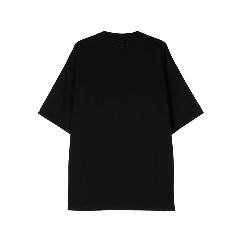 Shop Vetements Logo Printed Oversized T-shirt In Black
