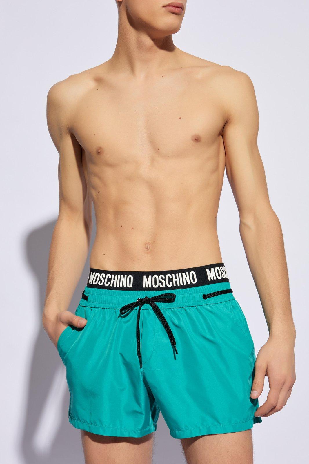 Shop Moschino Logo Waistband Drawstring Swim Shorts