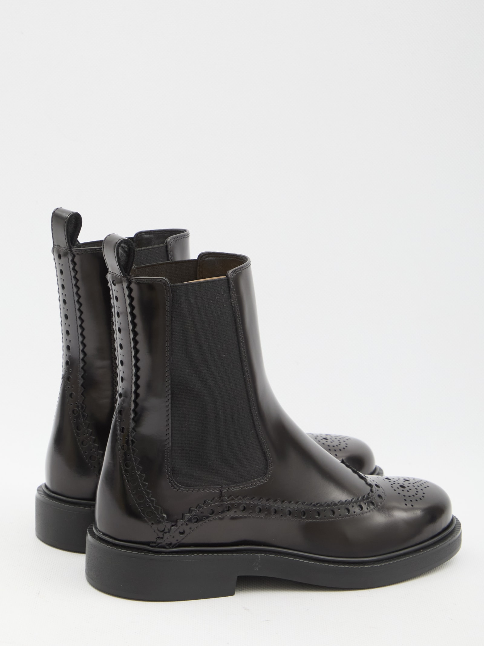 Shop Tod's Leather Chelsea Boots In Black