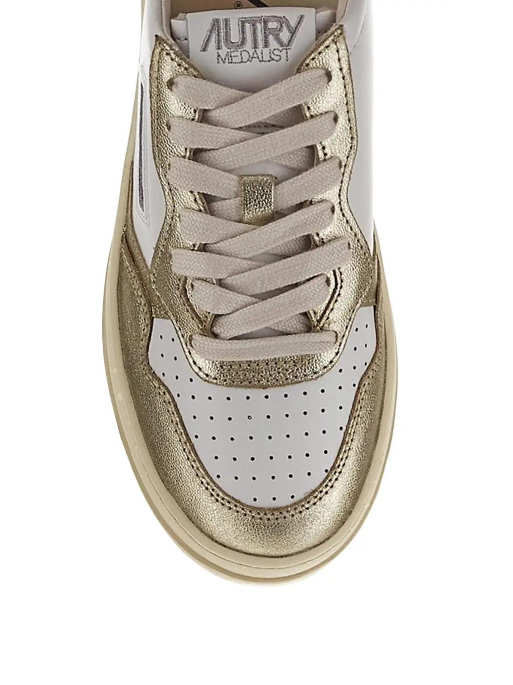 Shop Autry Platform Low Sneakers In Golden