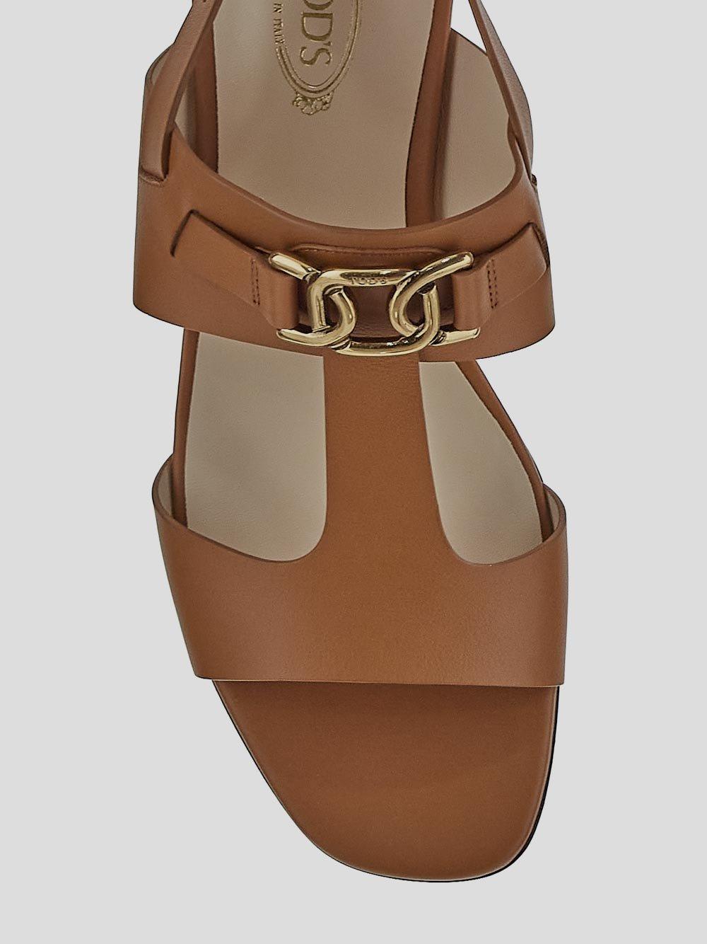 Shop Tod's Logo Engraved Buckle Fastened Sandals
