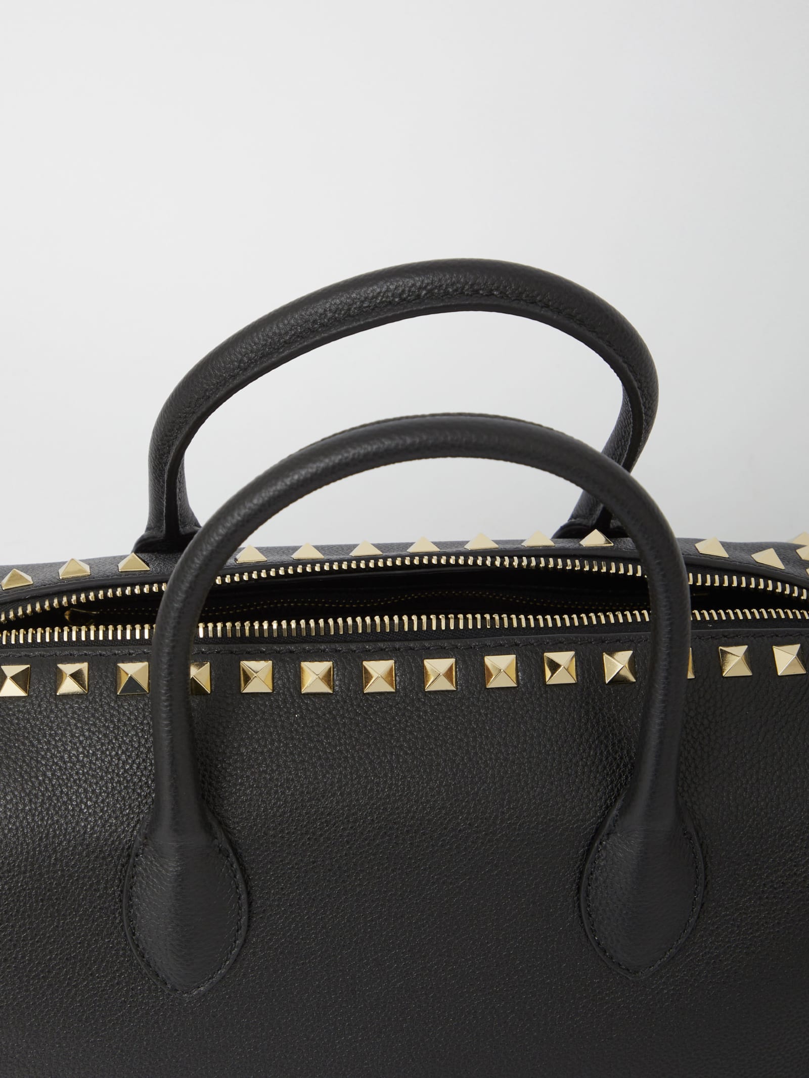 Shop Valentino Rockstud Handbag In Black