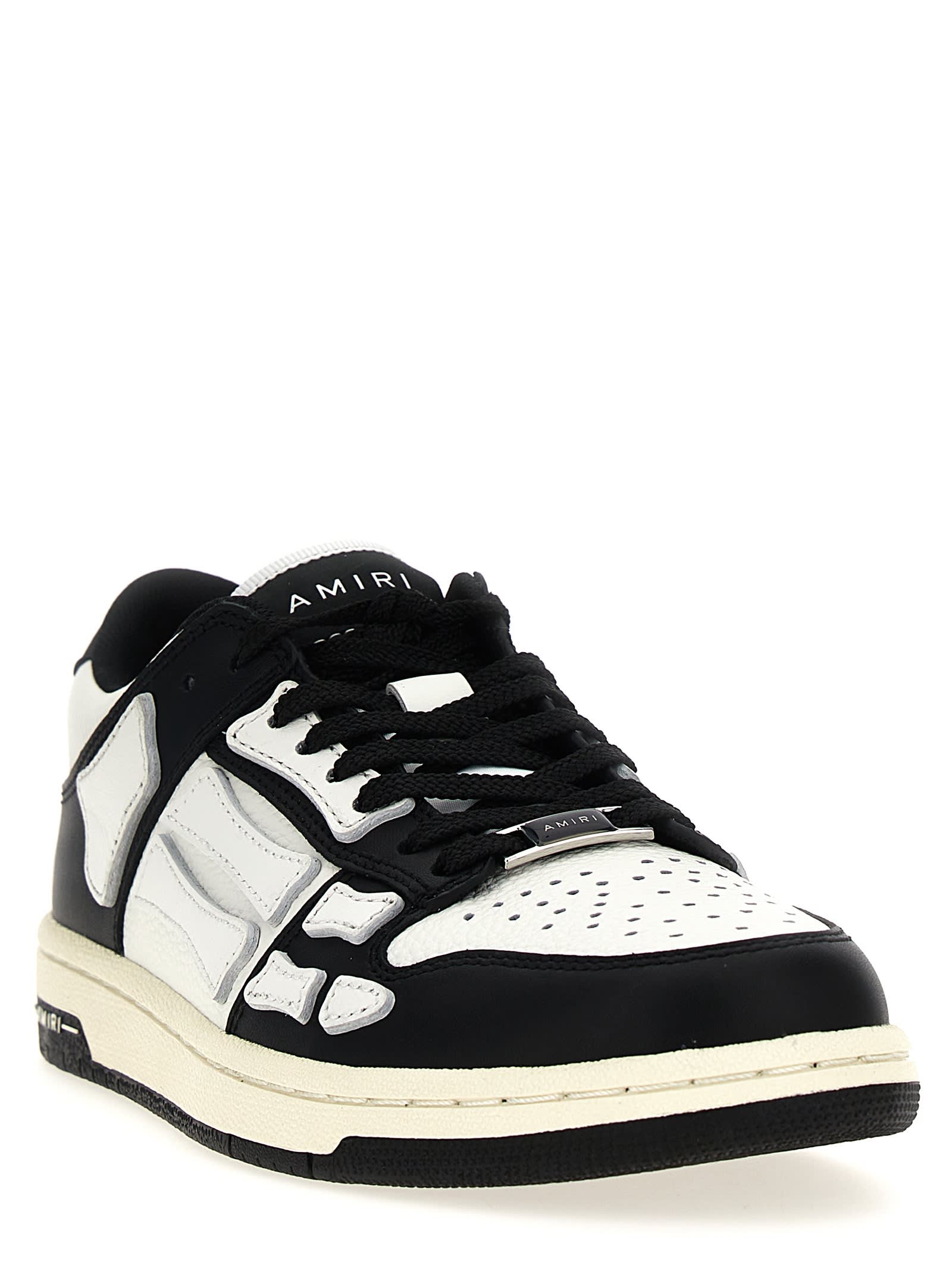 Shop Amiri Skel Top Low Sneakers In White/black