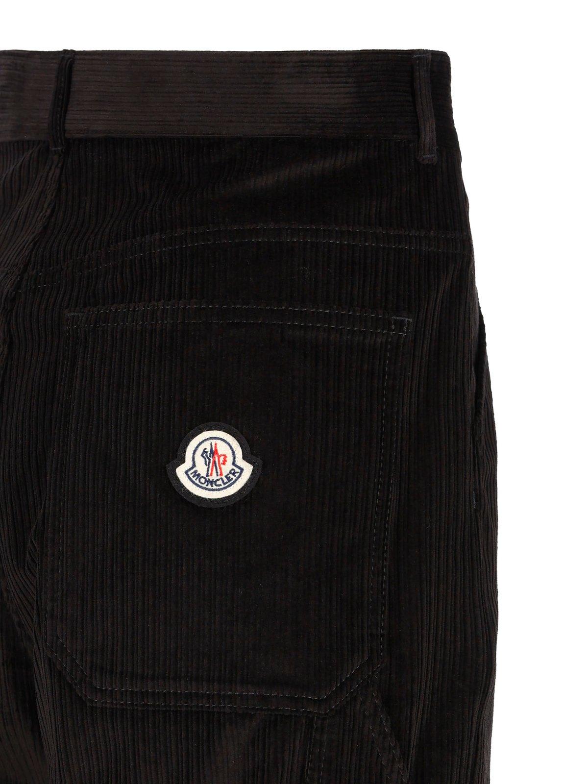 Shop Moncler Logo Patch Straight Leg Pants In Black