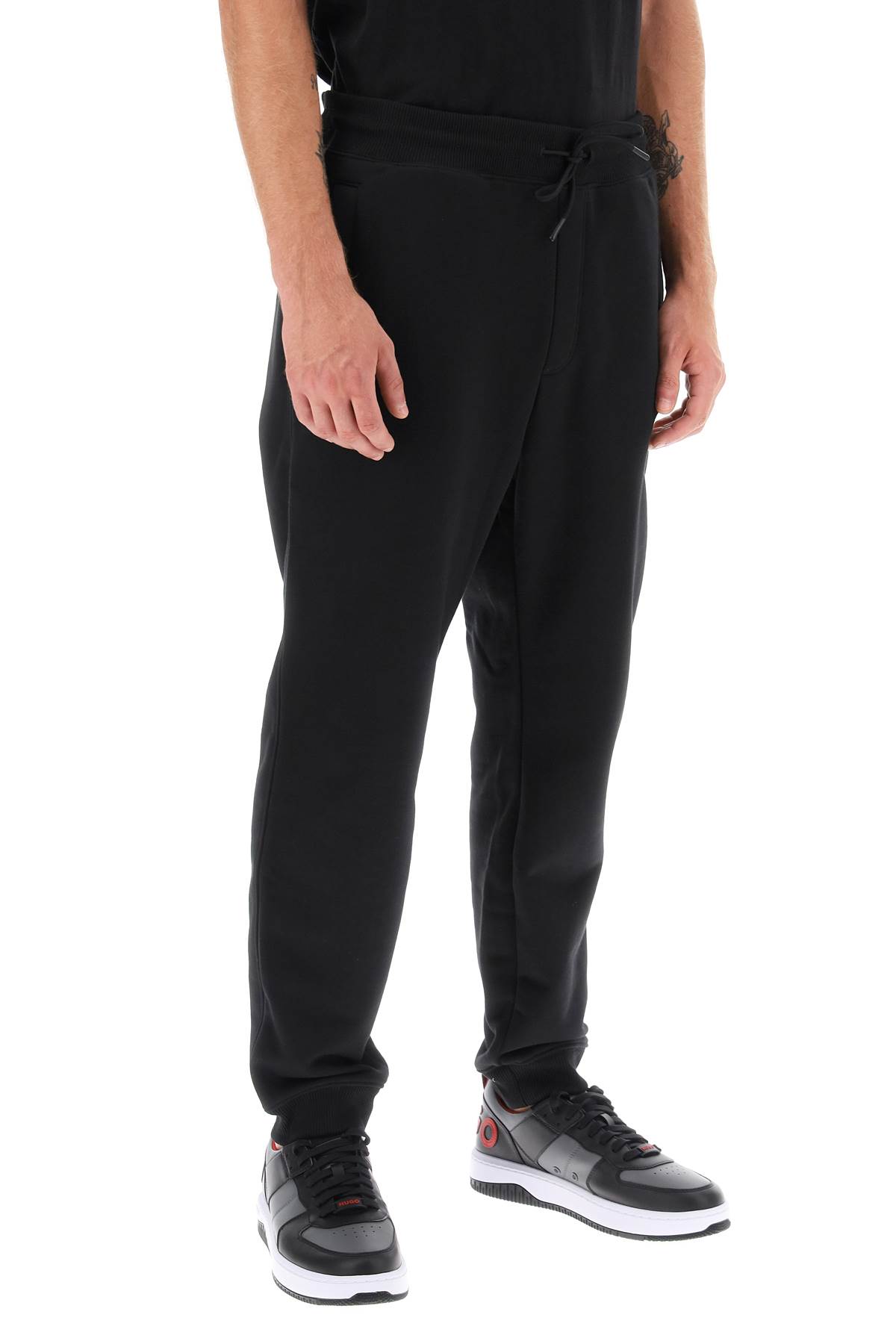 Shop Hugo Boss Drokko Double Logo Sweatpants In Black (black)