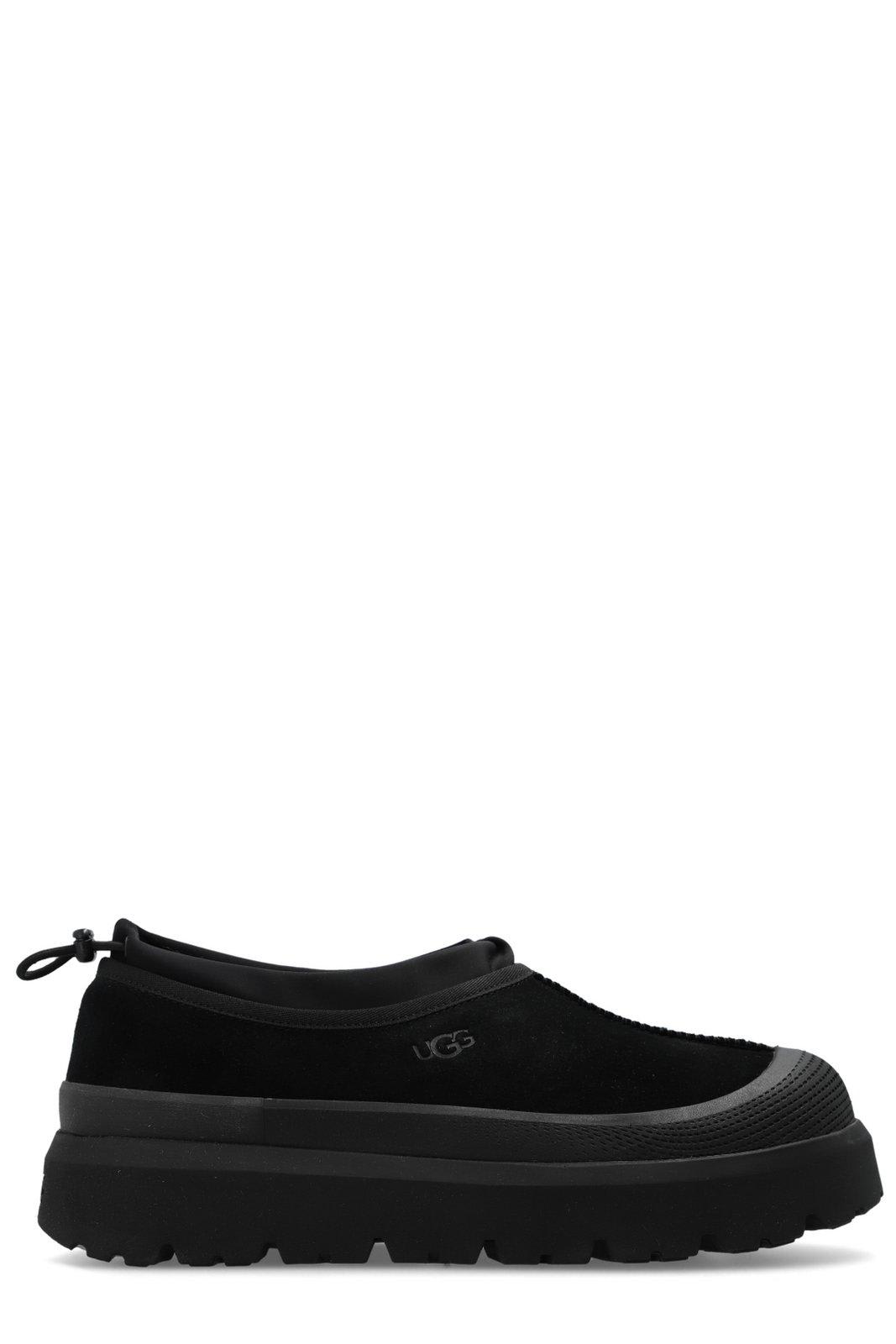 Shop Ugg Tasman Weather Hybrid Slip-on Slippers In Bblc Black / Black