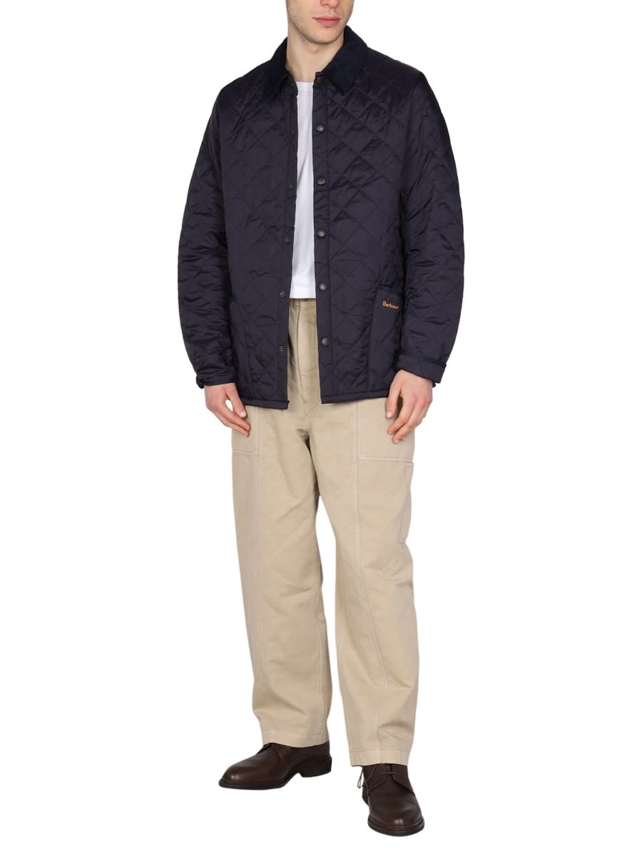 Barbour Heritage Liddesdale Blue Jacket With Classic Corduroy Collar And Logo Lettering On The Front In Tech In Blue