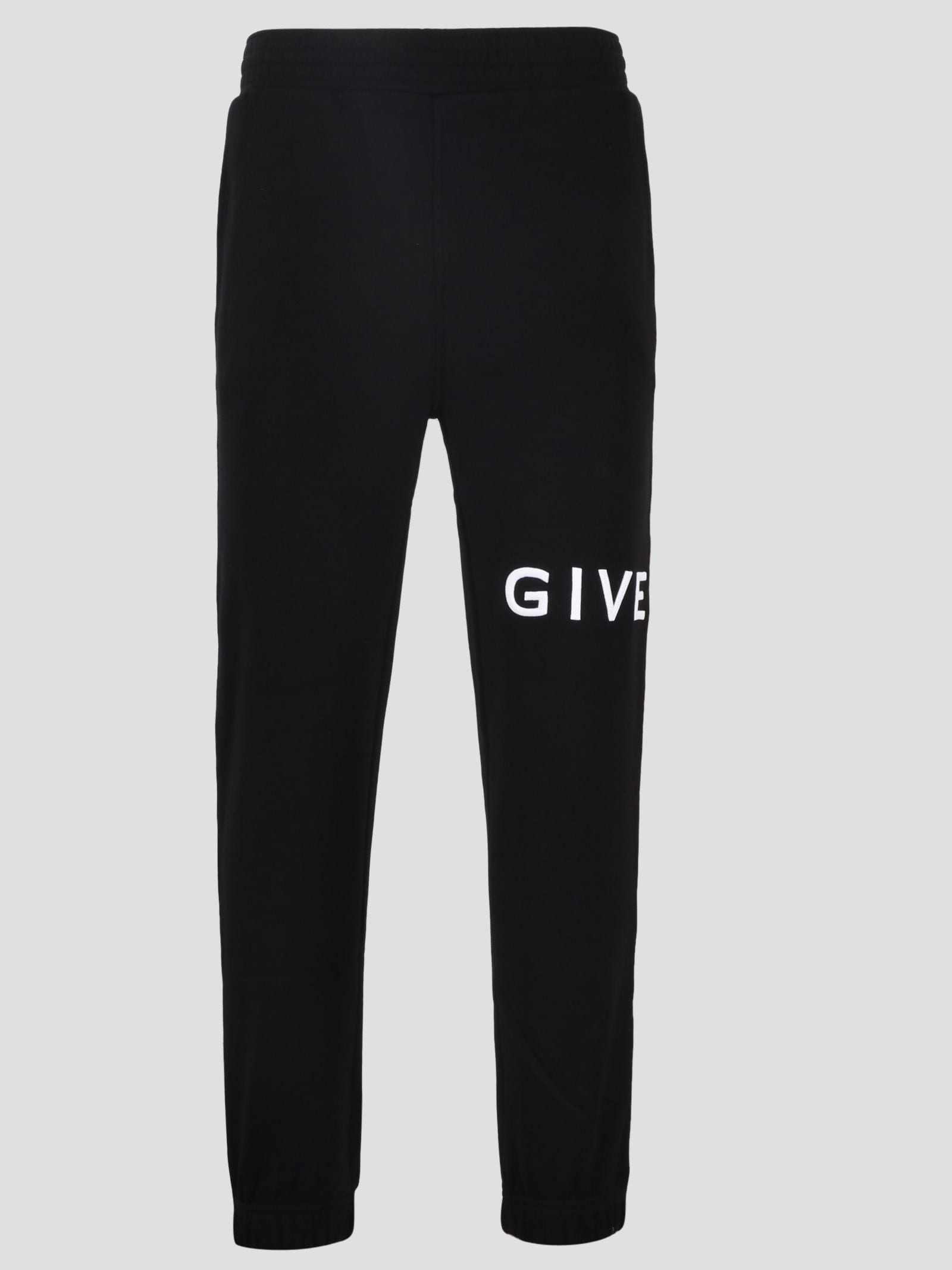 Shop Givenchy Fleece Trousers In Black