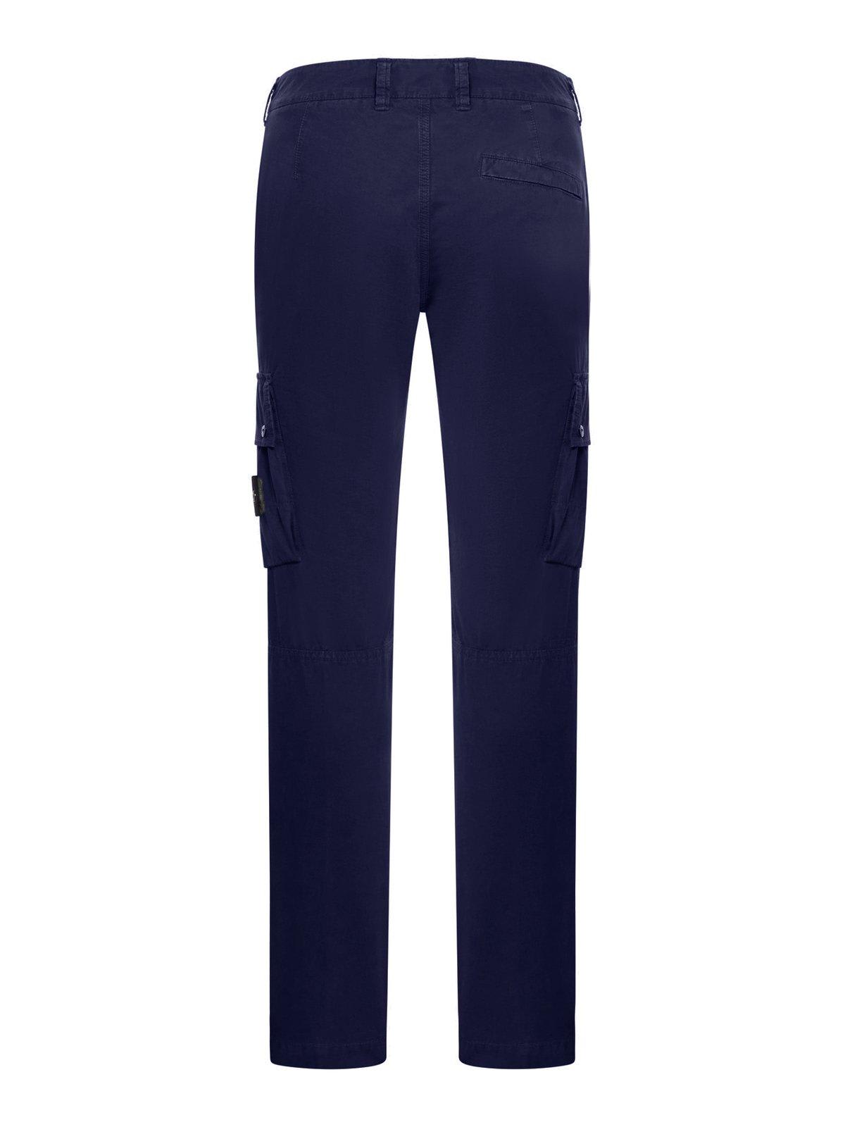 Shop Stone Island Low-rise Slim Trousers In Blue
