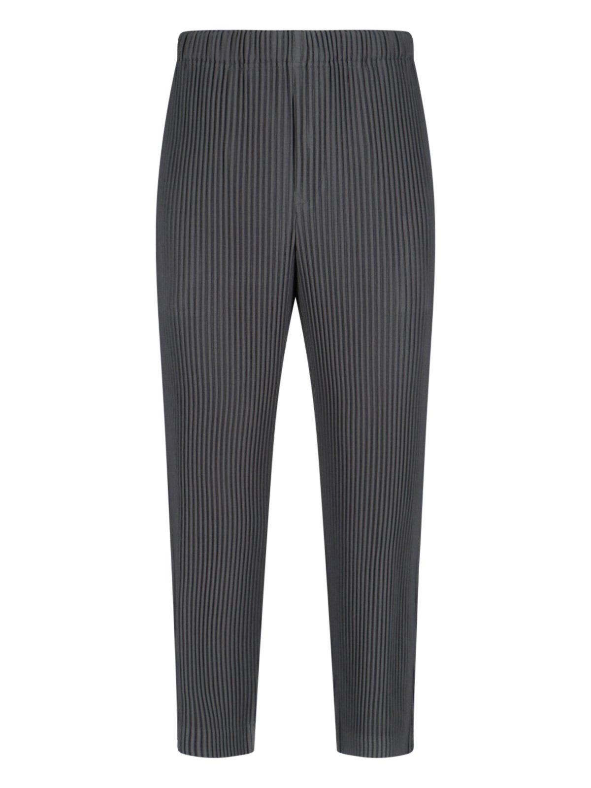 ISSEY MIYAKE PLEATED TAPERED LEG TROUSERS