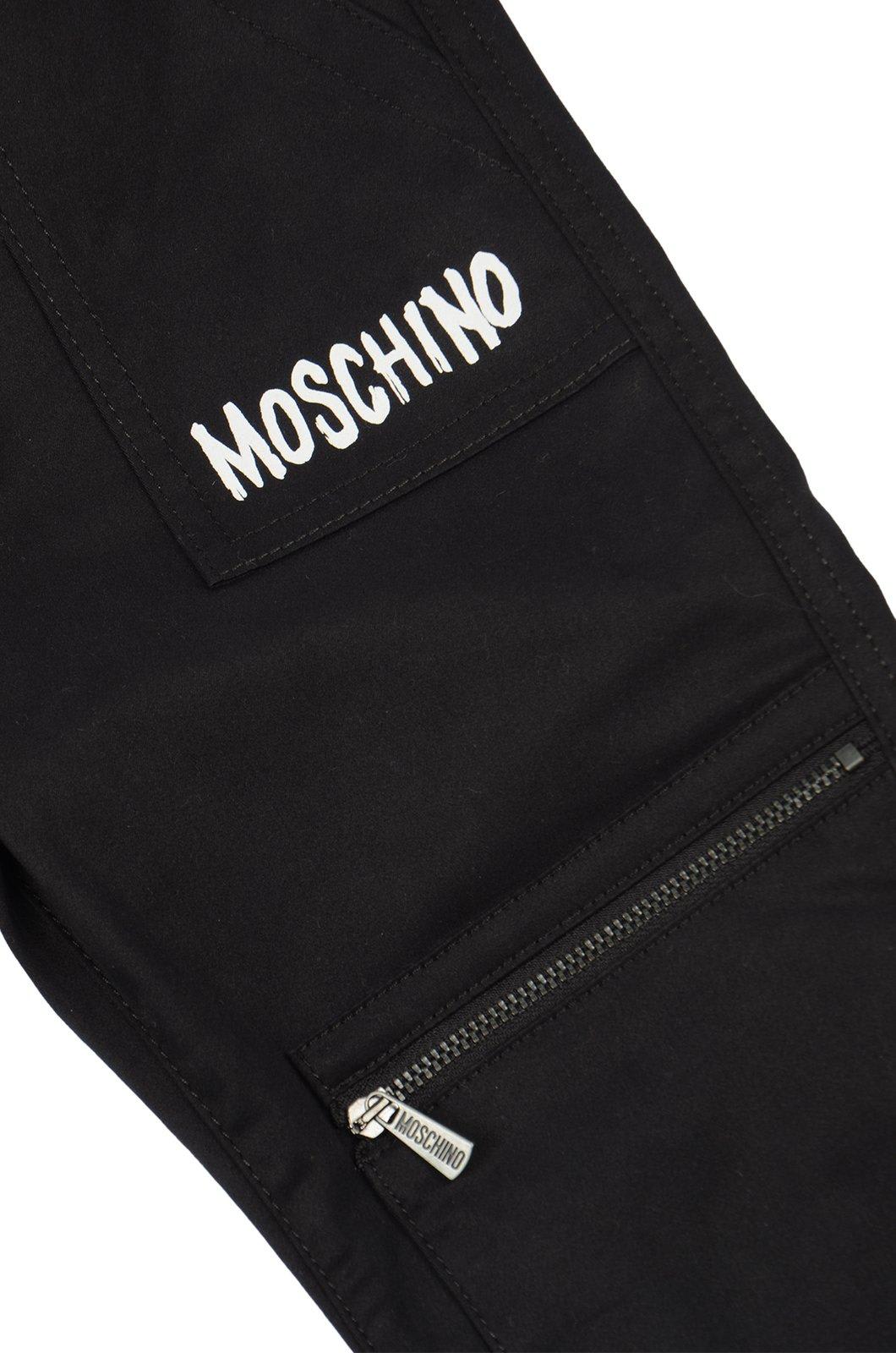 Shop Moschino Mid-rise Logo-printed Trousers