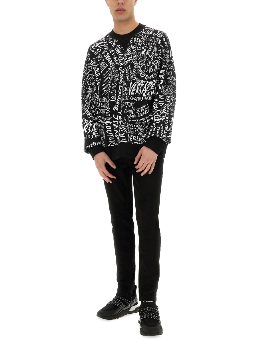 Shop Versace Jeans Couture Sweatshirt With Logomania Print In Black