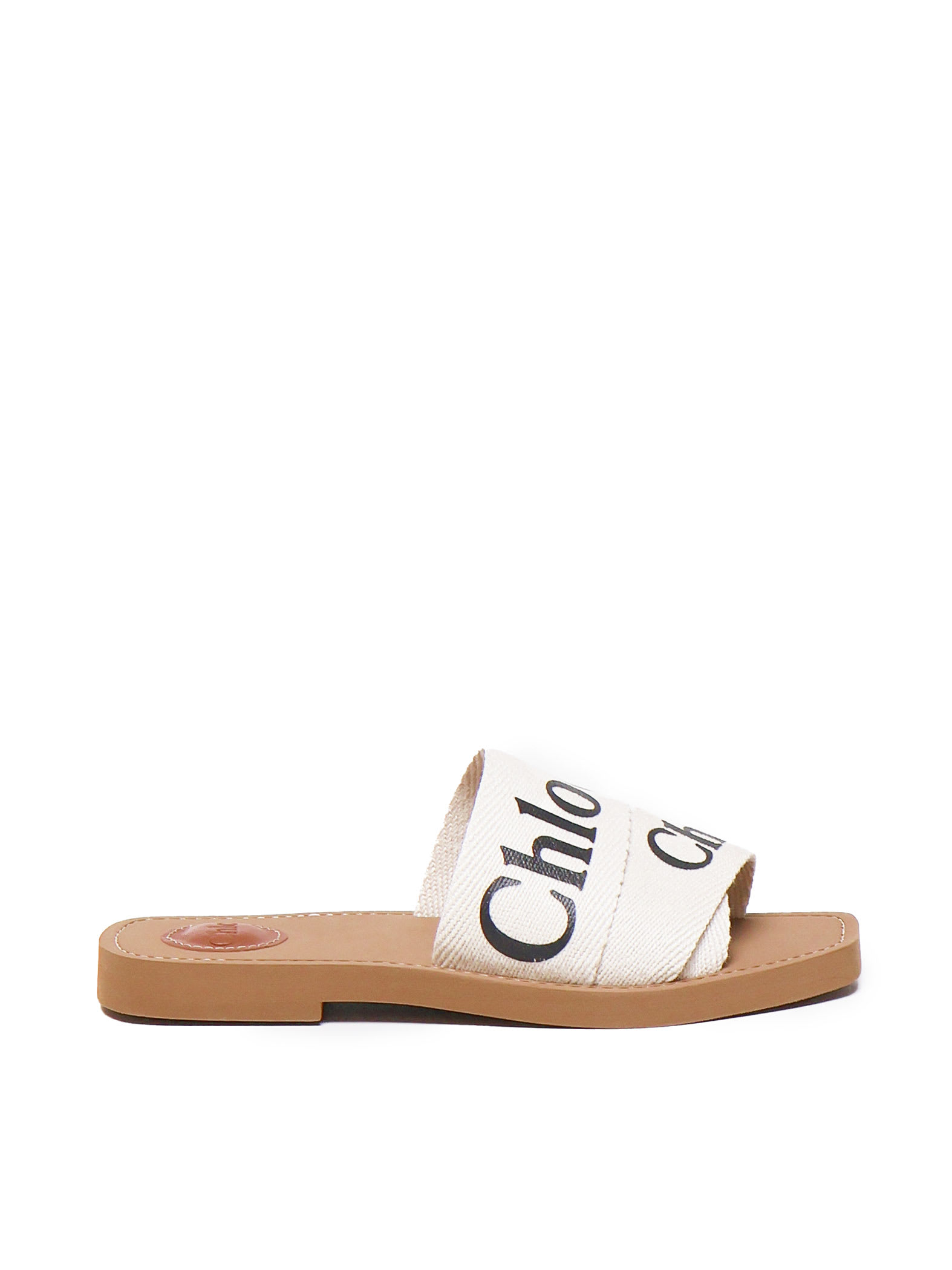 Shop Chloé Woody Slides In White