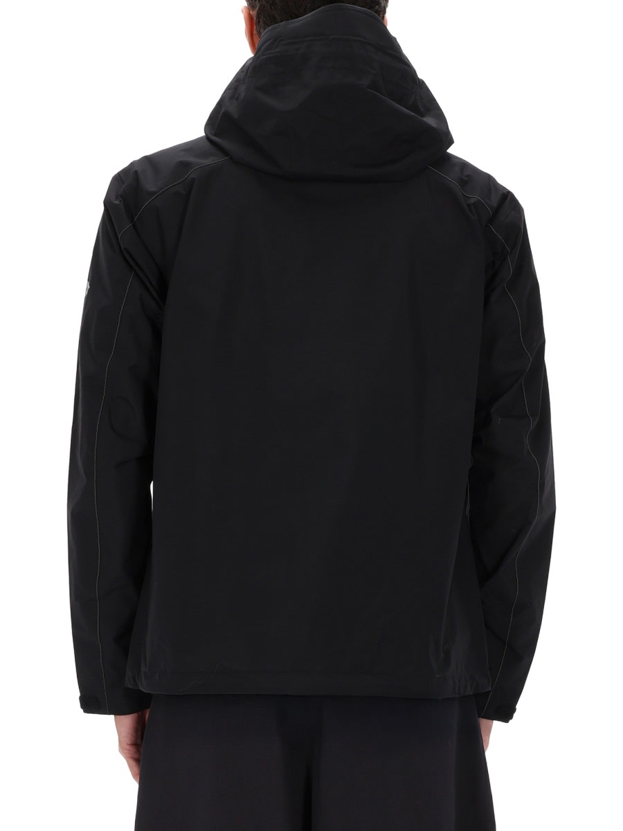 And Wander Rain Jacket In Black