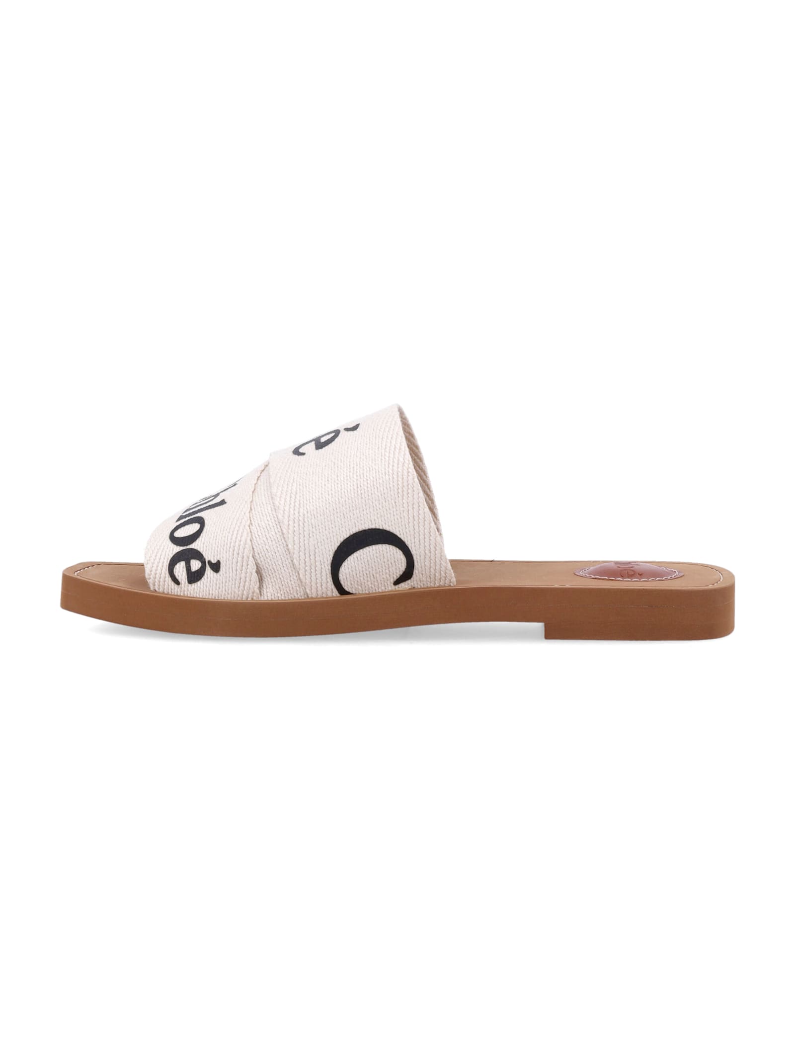 Shop Chloé Woody Slides Sandals In White