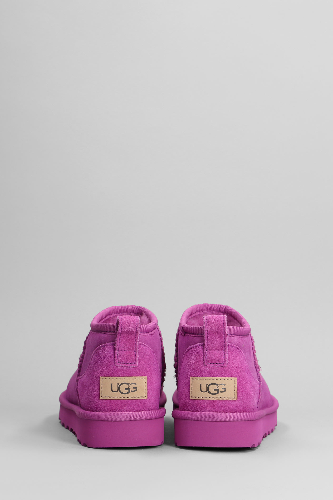 Shop Ugg Classic Ultra Mini Low Heels Ankle Boots In Fuxia Suede